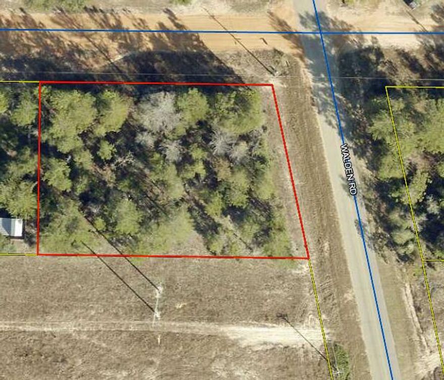 Looking for a great property to build or mobile homes are allowed this 2-corner lot parcel has paved road frontage and faces two separate roads.  Mossy head water is available and power runs in front of lots.  Lots are level and wooded and allows for plenty of privacy in your own clearing.