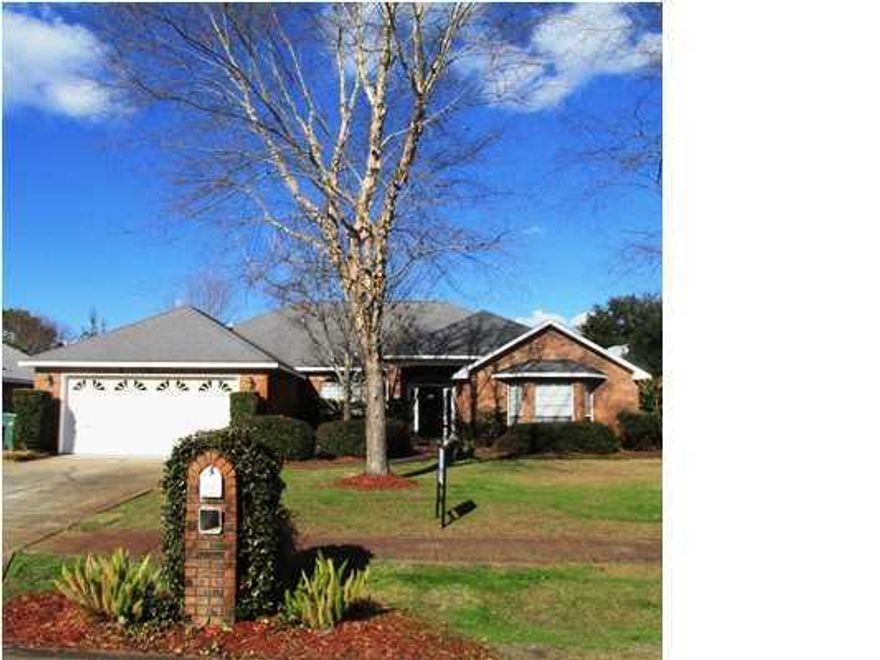 This beautiful brick three bedroom, two and half bathroom home is located in the heart of Destin near the Choctawhatchee Bay. This Destin rental home offers a split floor plan with a spacious entry way that leads to the dining room and an open living room, which features a cathedral ceiling and a gas fireplace. The kitchen comes equipped with ample cabinet space, a breakfast bar, and a breakfast nook. In the master suite you will find tray ceilings as well as a double vanity, jetted tub, and a separate shower in the bathroom. This unfurnished home also includes a large fenced backyard with a play set, two car garage, and washer/dryer connections in the laundry room. You will enjoy the ease of a well-manicured lawn with lawn maintenance included, as well as trash service.