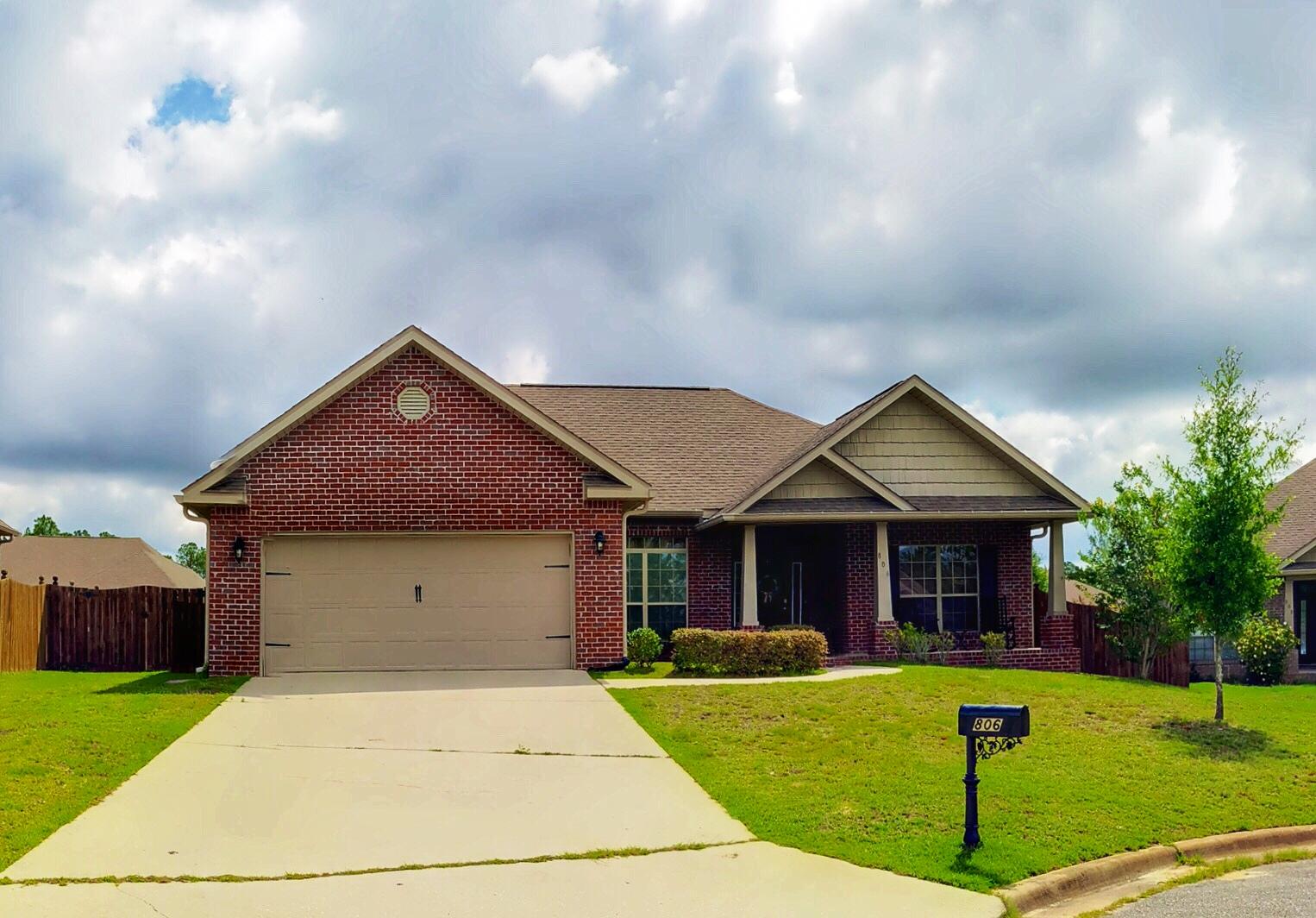 Don't miss out on this beautiful 3 bedroom / 2 bath all brick home conveniently located South of I-10 in Rolling Ridge S/D. The open concept makes entertaining a breeze. The living area is spacious with a vaulted ceiling and arched entry to the dining area. The kitchen features ample cabinetry, a breakfast bar and breakfast nook. The roomy master boasts a trey ceiling and double windows for natural light. The master bath has double vanities, his and her walk in closets, a soaking tub, and separate shower. Off the kitchen are two additional bedrooms and a full bath. The back yard is flat and fully fenced. Located in a cul de sac providing little traffic.