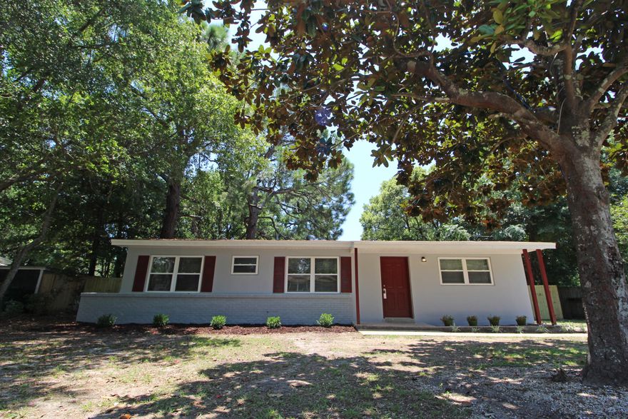 CHECK OUT THIS FRESH NEW MAKEOVER! Take a look at this newly renovated home on a large lot in the heart of Fort Walton Beach. Living area has beautiful plank laminate flooring throughout and soft designer paint. Dining area has sliding glass doors that lead out to the backyard. Light and bright kitchen with new cabinets to include soft close drawers, granite counter space, new stainless and black appliances and a pantry. Inside laundry room with a nice folding cabinet with granite top as an extra. Master bedroom has a walk-in closet. Master bath has new vanity and a custom tiled shower. Three additional bedrooms and a full bath with tiled surround complete this perfect package. HVAC system has replace 2018, water heater 2014, roof in 2012 and new white vinyl windows replaced in 2016.  Centrally located to everything schools, shopping, restaurants, beaches, downtown Fort Walton Beach, Eglin AFB and Hurlburt Field AFB.  Stay in town and enjoy NO commute.  Call today to take a look inside.....