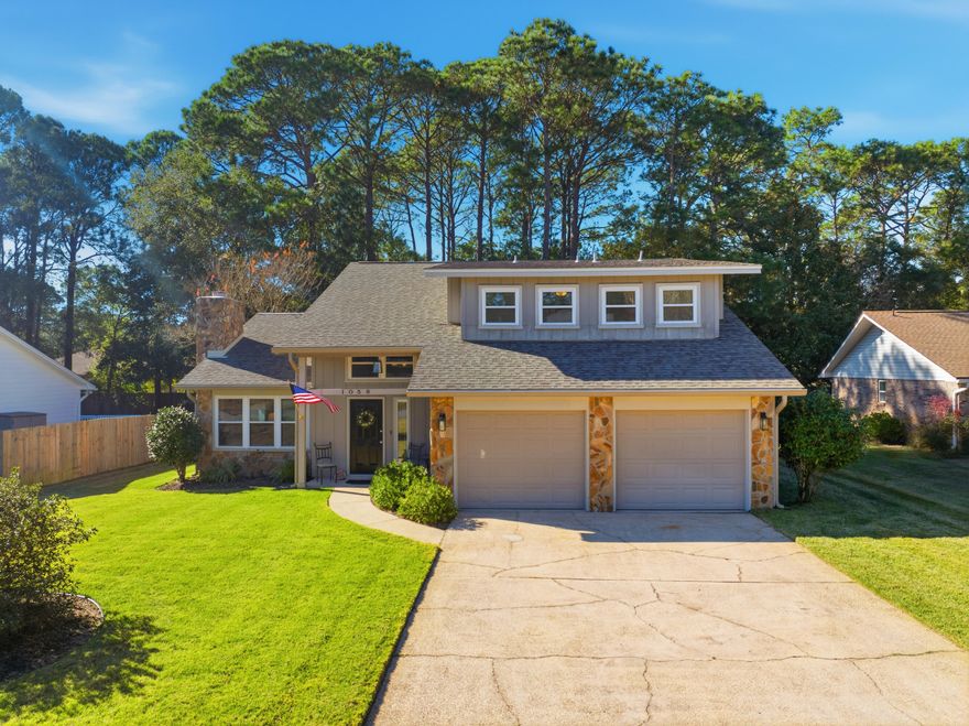 Welcome to your dream home, tucked away on a quiet street in the highly sought-after Bluewater Bay community. Set on a generous, private 0.30-acre lot, this beautifully renovated 4-bedroom, 3.5-bath residence offers 2,160 square feet of thoughtfully designed living space, blending timeless charm with extensive modern updates.  Inside, a bright and open floor plan welcomes you with soaring vaulted ceilings, a decorative fireplace, and a seamless flow between the living and formal dining areas. Rich acacia hardwood flooring enhances the main living spaces, while quality finishes and fresh neutral paint create a clean, inviting atmosphere throughout. The stylish kitchen features granite countertops, stainless steel appliances, a walk-in pantry, and opens directly to a newly built back deck