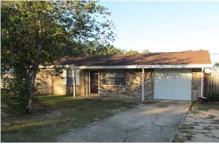 This is an updated brick home in a great location in Shalimar. Huge fenced backyard, room for a pool! Kitchen cabinets, floors, paint all updated as well as more!! A must see at this price. Make your appointment today!!