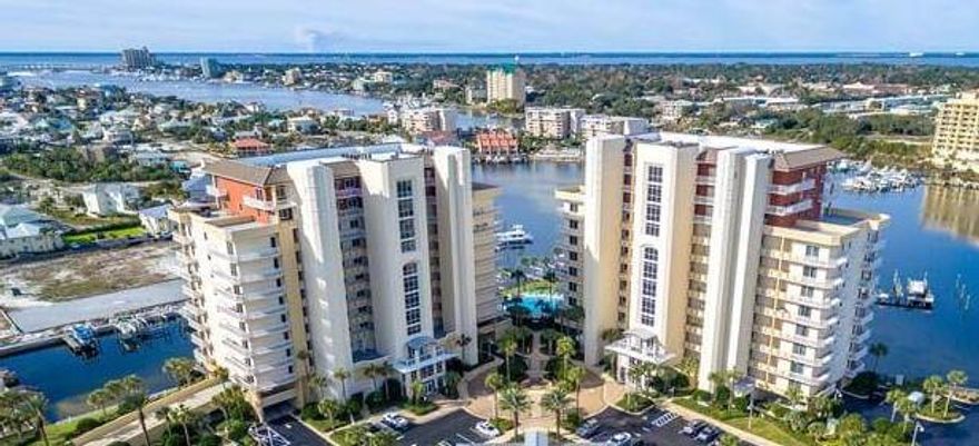 FANTASTIC LOCATION. This unit Harbor Front with beautiful gulf views from this 7th floor with DEEDED BEACH ACCESS. Enjoy breathtaking views from your balcony or front door. This is Luxury living at its best. Take the water taxi to dinner, sit with coffee over morning sunrises and a cocktail over evening sunsets plus there is a fabulous city view. Harbor Landing is a highly sought after gated waterfront condominium that incorporates deeded beach access and a 60 slip marina. Owners enjoy nearly 5 acres of impeccably maintained grounds, two pools, 2 hot tubs and a fitness center. While this condo has never been rented short term, short term rentals are permitted.