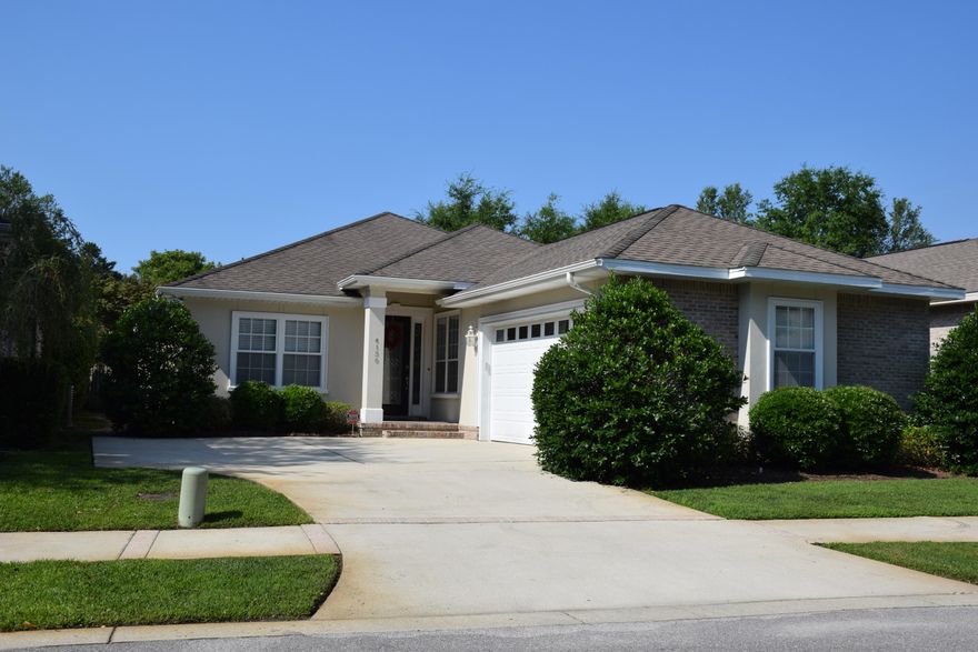 This one's a winner! Skillfully designed and built by Greg Goodwin, this home speaks quality from the 2x6 framing to the beautifully finished interior. Most of the 9 - 10' ceilings are finished with deep crown molding. Easily maintained tile floors have been installed in the foyer, dining room, eat in kitchen, laundry and baths. Burnished wood floors look terrific in the great room and the master bedroom. The open flow between the kitchen and great room encourages a relaxed, friendly atmosphere--great for both everyday life as well as special occasions! Gorgeous maple cabinetry, Corian countertops, Kenmore Elite appliances, and a large pantry = a perfectly equipped kitchen. Eat-in space and a breakfast bar available for casual meal options. The tiled dining room (currently used