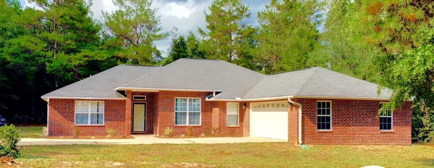 Welcome Home to 5542 Hwy 393. This custom home is situated on just over 2 acres. 4 bedrooms, 2 bathrooms, Formal Dining Room, Florida Room and was recently completely renovated. This home is on over 2 acres of wooded level land. The interior has an open concept floor plan with an eat in kitchen, breakfast bar and separate formal dining room. Expresso Stained Cabinetry, Neutral Countertops and Above Cabinet Lighting. The great room has built in storage for electronics, new laminate wood flooring, underlit plant ledges. The master bedroom is completely private with a separate hallway entrance, walk in closet, jetted soaking tub, separate walk in shower, and double vanities. The walk in master closet also is a walk through and a second entrance into the laundry room. Call today to see!