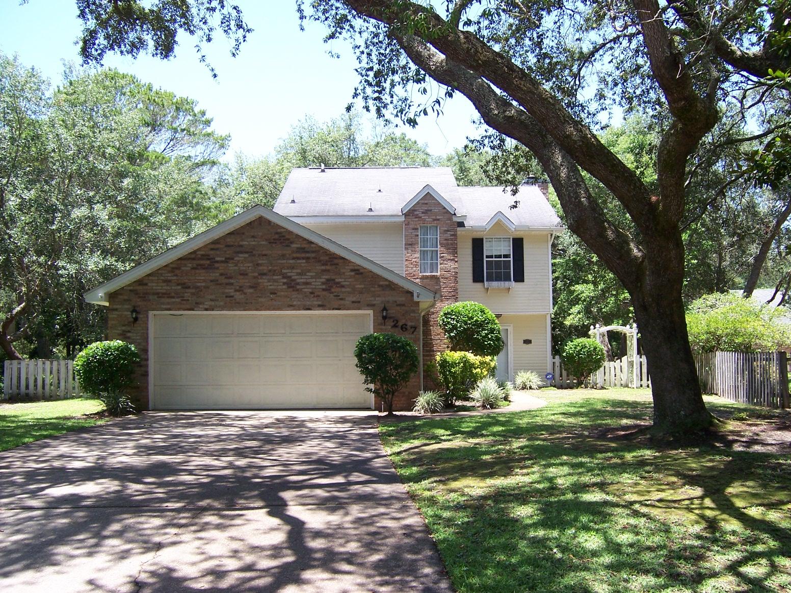 Lovely, well maintain home in great location. Close to shops, schools, bases and beaches. Tiled Entrance foyer Opens to spacious Living Room with Fireplace. Double French doors to Fenced Backyard. To left of entrance Foyer is a very open, bright Kitchen and Breakfast area. This area is tiled. Kitchen has lots of Cabinets space, Smooth Top Jenn Aire stove/oven. Formal Dining Area off Kitchen area also opens to Living Room. Berber Carpet through out Living Room and Bedrooms. Crown Molding in Living area. Downstairs is Laundry room area and half bath. All bedrooms are upstairs. Master Bedroom with Walk in Closet and Master Bath. Double Vanities. Other two Bedroom share a full Bath. NON SMOKING UNIT. SMALL PET CONSIDERED WITH OWNERS APPROVAL.