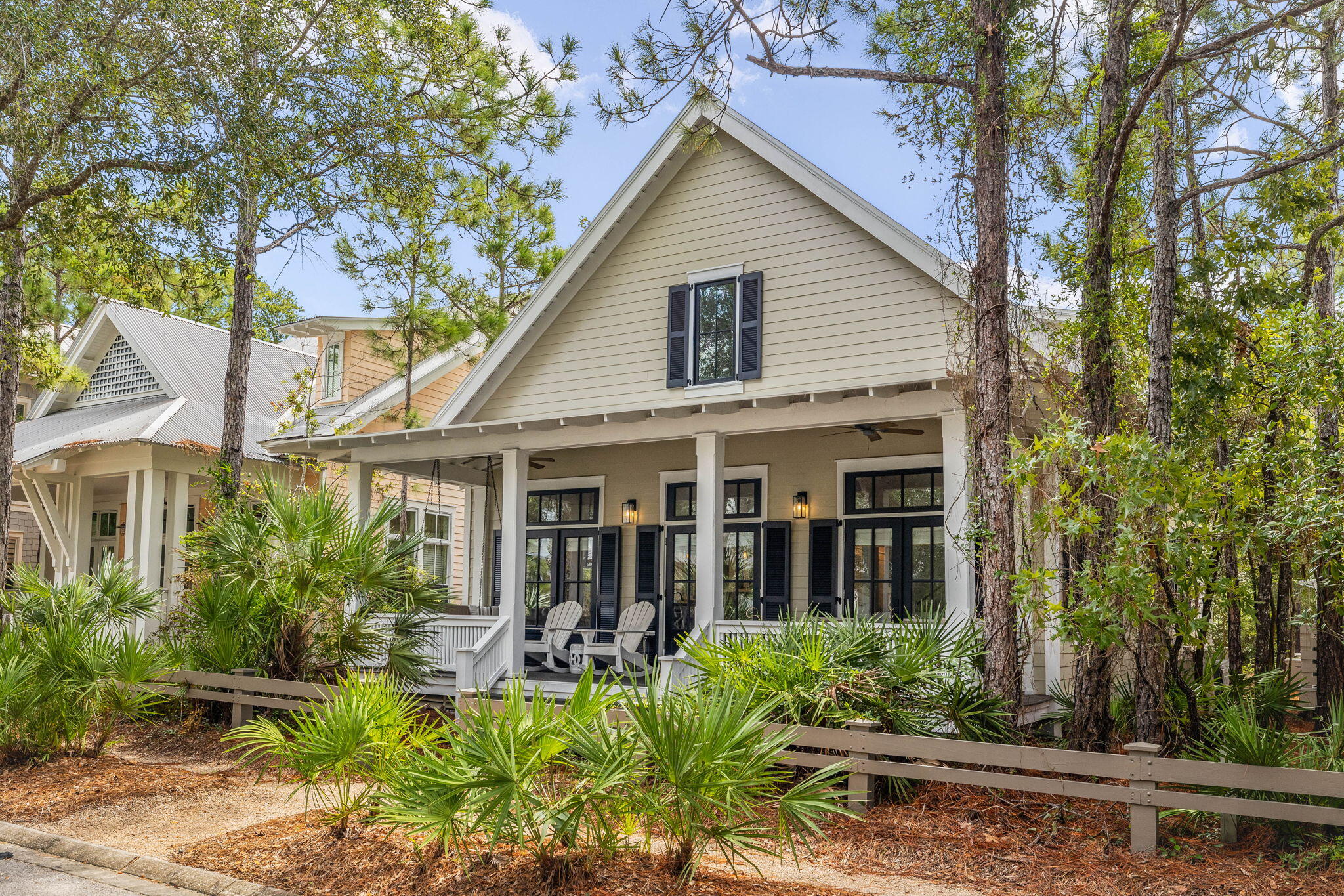 Camp District of the WaterColor community is home to this 4 BEDROOM beach house! Just steps away from Camp Watercolor where you can go on the lazy river, swim and more. Special assessment PAID IN FULL!  Charming front porch-a perfect place to retreat and enjoy your morning coffee. Natural hardwood floors and beautiful granite countertops, the interior of the home will exceed your expectations. The primary bedroom opens up to a screened porch. Just a 6-min bike ride to Seaside and Watercolor Beach Club. Watercolor has much to offer including the Beach Club, multiple community pools, the Boathouse w/ kayaks, SUP and canoe rentals, pickle ball, tennis and trails. NEW decking at the front/rear; NEW spray foam insulation. Great rental projections.