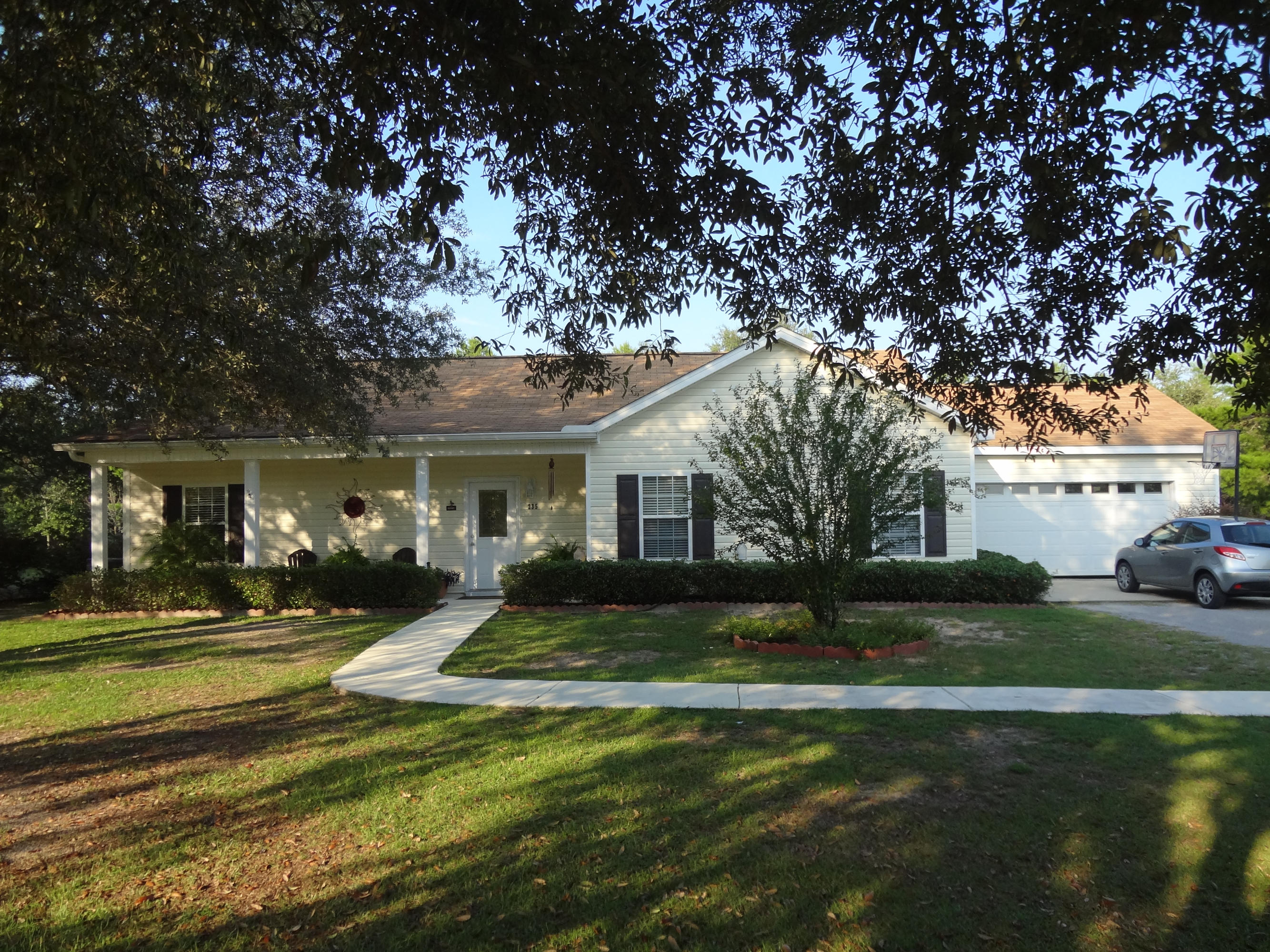 Beautiful home with 2200 sq. ft. under roof on 1/2 acre lot. Significant upgrades to include engineered wood floors, in-ground pool and stunning landscaped deck, shallow well and irrigation system. Brand new 3.5 ton A/C system installed 9/16/14. Just steps away from Black Creek Boat Launch which leads to Bay & Gulf. Nice new neighborhood - only minutes from the beach. Home has open floor plan with large master bedroom. Separate shower and his & hers closets. A must see!