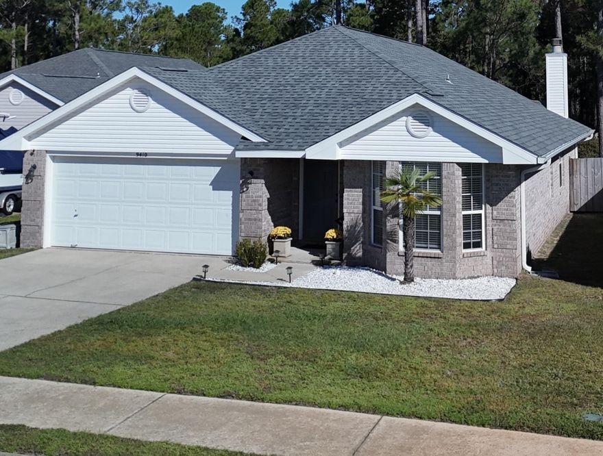 Great all brick home at Whisperwoods estates, with a sweet price.  This home is very clean and is painted with neutral colors and has attractive laminate flooring.
The home is just 8 miles west from Hurlburt Field's main gate and 6 miles from the beautiful Navarre beaches. The street is a cul-de-sac and has sidewalks. Its features a 2017 roof, 2017 energy water heater, Oct 2024 new heatpump air conditioning system, new dishwasher, updated paint, light fixtures, and fans.  Comes with microwave and security camaras (w/ an app).  The yard is very spacious, fenced and has a lawn pump, and small storage shed.  The garage has attic access stairs for extra storage.  Don't miss your opportunity to own this beauty, can be a great investment property or your sweet home.