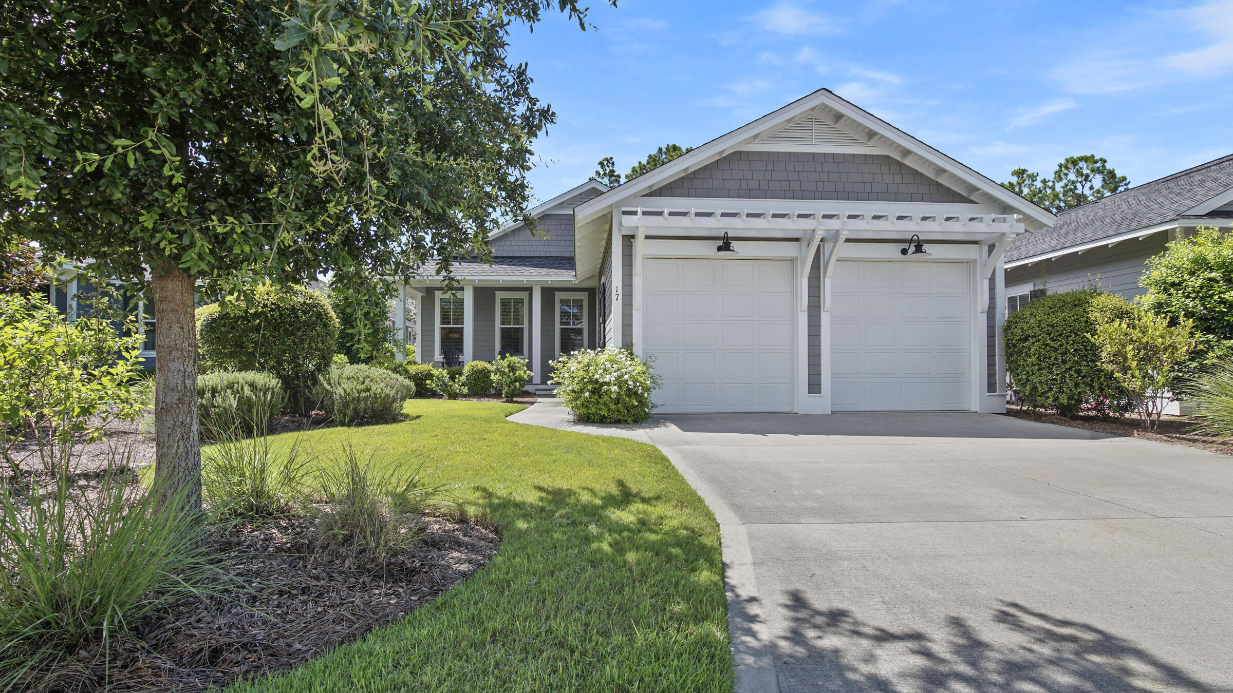 Located in Phase I of Watersound Origins, this Huff Home Begonia Model has Barely Been Used and is Meticulously Maintained. One Story 3 Bedroom, 3 Bath Open Floor Plan has both a Front Porch and Back Screened Porch. Mature Landscaping Surrounds the Property w a Lush Backyard Backing up to a Rarely Used Walking Trail. Upgrades include Plantation Shutters, a High End Sound System, Quartz Countertops and Engineered Laminate Flooring throughout, WetBar in the Kitchen w Upper and Lower Cabinets, Under Cabinet Lighting, a Gas Grill Stub, Cabinetry in Laundry Room. This Floor Plan Flows with Great Natural Light and Includes a Walk In Pantry and Coat Closet. All Furnishings Negotiable. Amenities Include Golf, Pool, Fitness Center and Racquet Sports. Publix Coming to Front in 2022.