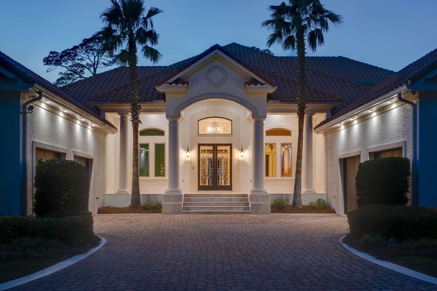 Elegance abounds in this luxurious, Mediterranean European-style Estate built by CD Jones. This beautiful Bay front estate begins with an impressive gated entry and circular paver driveway featuring a center fountain. Home situated on sparkling Fourmile Point BayFront in Driftwood Estates. Beyond the gated entry are softly illuminated lighting at twilight .Front Entry porch is set in all natural stone. Inside, the striking, two-story foyer leads you to the Formal Living area with Grand Piano in place , then leads right out to the expansive pool and outdoor living area. Fabulous finishes, the home features four bedrooms, 5 full bathrooms 1 half-bath. Master suite and privacy garden conveniently located on the first floor. The gourmet kitchen has top-of-the-line appliances