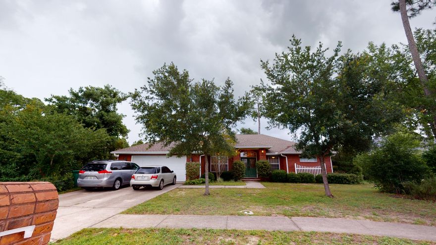 Immaculate one owner, custom built home on a large level lot. Centrally located, in a very peaceful and upscale Bayshore Place S/D, this one level home is only minutes to public boat ramp, military bases and beaches of the Emerald Coast. 4 Bedrooms (carpet and engineered wood flooring) built in a split floor plan design 3 and 1/2 baths with an additional office, eat in kitchen and formal dining with an open great room, high ceilings, recessed lighting. The kitchen has tiled floors, stone counter tops, stainless steel appliances and maple cabinetry. The master bedroom has His/Her walk-in closets, whirlpool tub and over sized walk-in shower. Large rear covered porch and fully fenced back yard that is extra deep and provides plenty of room for a swimming pool or other entertaining.