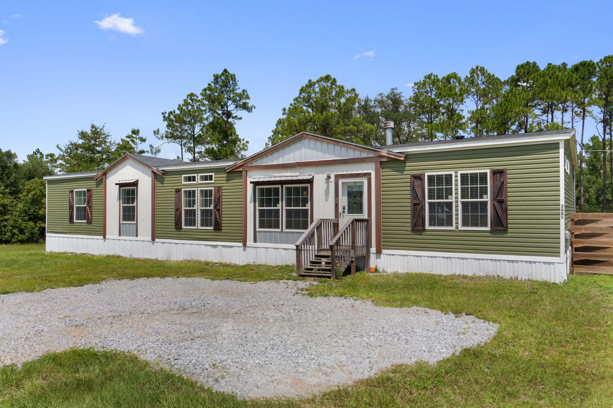 Welcome to 3681 Grady Johnson Rd. in Crestview! This 2021 manufactured home offers modern finishes and plenty of space, all set on a peaceful two-acre lot. Step inside to find a spacious open floor plan with a large family room and a beautiful kitchen featuring a granite island that's perfect for cooking, entertaining, or gathering with loved ones. The drywall interior adds a polished touch throughout, while the generously sized bedrooms provide comfort and functionality. Outside, enjoy a huge fenced-in backyard with room to play, garden, or relax in privacy. With its blend of style, space, and country living, this home is ready for its new owners.
