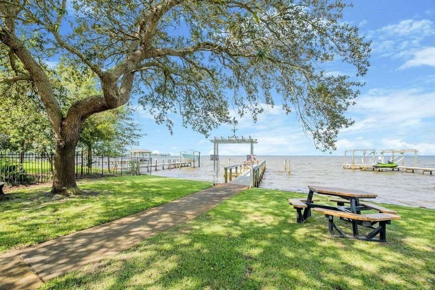 Discover Pelican Bay's Bayfront community, a serene, gated neighborhood with exclusive access to a private Bayfront park for residents. Enjoy new pickleball courts and a prime location just 10 minutes from Grand Boulevard's shopping and dining. Sacred Heart Hospital is also nearby. This premium cul-de-sac lot, over 1/3 acre, is ready for your dream home, with architectural plans available. Contact us to learn more about this exceptional community!