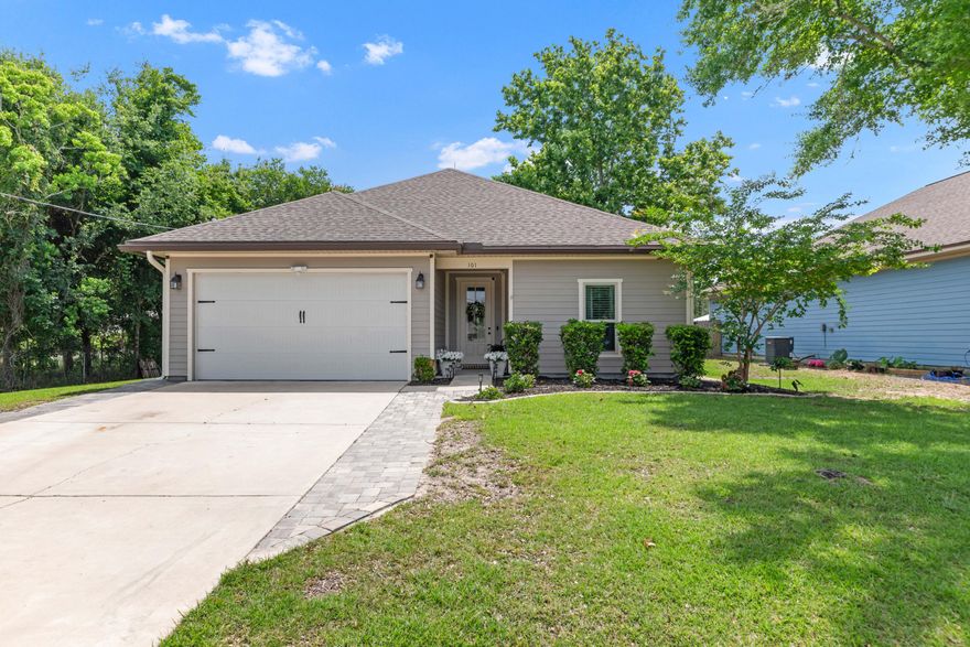 Beautifully designed 3-bedroom, 2-bath home nestled on a spacious .26 acre lot. Boasting numerous custom upgrades, this home combines elegance and comfort in every detail. Inviting open floor plan, highlighted by two tray ceilings with crown molding and a large family room that seamlessly flows into a generously sized covered back porch with Trex flooring, perfect for entertaining or relaxing outdoors. The gourmet kitchen features custom all-wood cabinetry w/ soft-close drawers, granite countertops, large walk-in pantry, stainless steel appliances including a refrigerator w/ice maker and tile flooring in all wet areas. Both bathrooms offer elevated finishes, including: Master bath also has dual sinks and a custom tile shower.  This home is a MUST SEE!! NO HOA!!