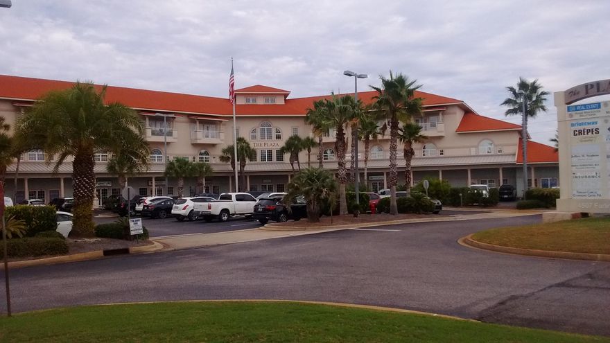 New to market is this beautiful, well-designed space in The Plaza. The open floor plan is perfect for a professional services company, showroom, or creative office space. This unit features stamped and stained concrete floors, open work space, dimming lights, surround sound, and large conference/executive office with custom built-in cabinets. Space is available on the monument sign with this unit.