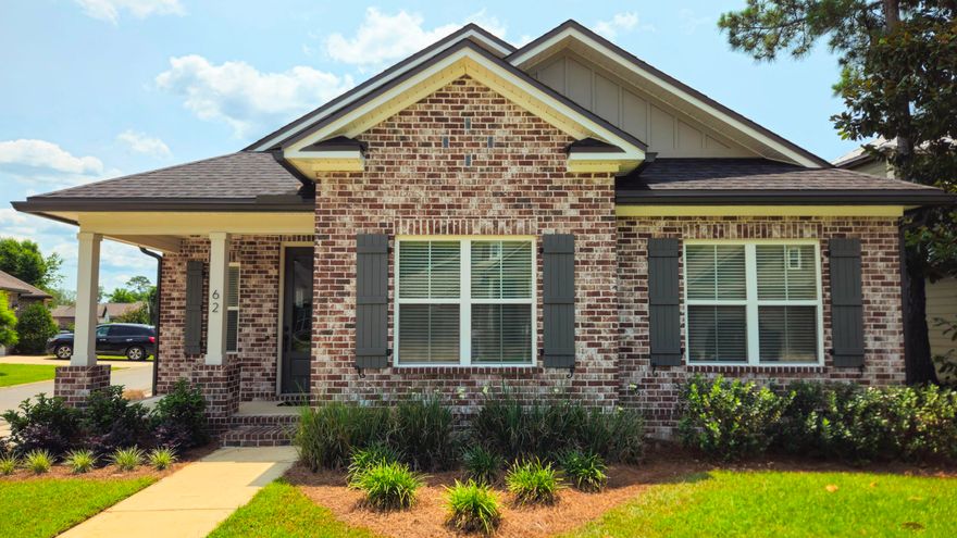 Welcome to 62 Pintail Blvd, a stunning 4-bedroom, 2.5-bathroom all-brick cottage custom-built by renowned builder Randy Wise in the tranquil Marina Village of Freeport, FL. This meticulously designed home blends modern comfort with charming cottage aesthetics, offering a perfect retreat for families or those seeking a serene lifestyle. Spacious Layout:
This 4-bedroom, 2.5-bathroom home features 9-foot ceilings throughout and 8-foot doors, creating an open and airy feel.

Custom Finishes:
Enjoy elegant custom trim, crown molding, and ship-lap accents, adding warmth and character to every room.

Inviting Living Space:
The cozy living room boasts an electric fireplace with a stylish mantel, perfect for relaxing evenings.

Thoughtful Design:
A convenient drop zone off the garage keeps your home organized. One bedroom features a custom-built bunk bed with three bunks, ideal for kids or guests. Another bedroom includes a built-in closet with drawers and a desk, perfect for work or study.

Luxury Details:
The home is carpet-free with high-quality flooring throughout. The laundry room, complete with a sink, connects directly to the master bedroom closet for ultimate convenience.

Durable Construction:
This all-brick home offers low-maintenance elegance and lasting quality.

Marina Village Amenities: 
Nestled in a quiet, family-friendly neighborhood, Mariana Village is just a short walk from a sparkling community pool and fun-filled playground. Enjoy access to a dog park, fishing spots, and the nearby marina, perfect for boating enthusiasts. This peaceful enclave combines small-town charm with modern amenities, all within close proximity to Freeport's natural beauty. The Freeport Regional Sports Complex, offering pickleball, tennis, and basketball courts, is just a 5-minute drive away, providing endless recreational opportunities for active families.  Just a short drive to the pristine beaches of the Emerald Coast and a quick bike ride or walk to the scenic trails and amenities of Hammock Bay.

Don't miss your chance to own this beautifully crafted cottage in the heart of Marina Village. Schedule a showing today to experience the charm and convenience of 62 Pintail Blvd!

