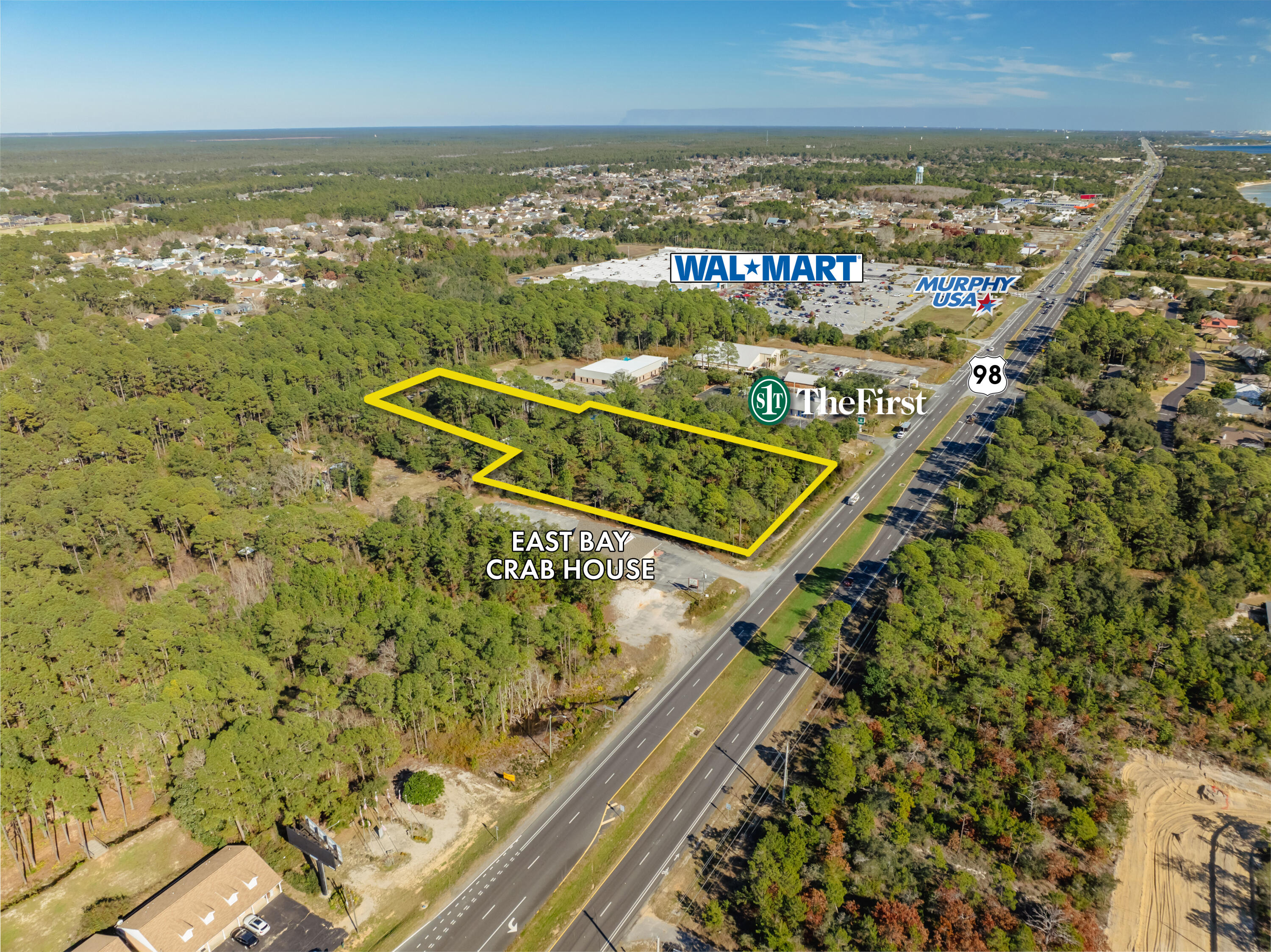 High visibility involving this prime ~2.57-acre assemblage that includes a commercial parcel fronting Highway 98 and the adjacent, contiguous parcel that is accessible via Timber Lane Road and contains a mobile home.  The Navarre, Florida market is flourishing with new development.  This subject site is oriented ~850' to the West from Wal-Mart. Both parcels are zoned HCD (Highway Commercial Development) through Santa Rosa County, Florida.  Zoning description is uploaded under the 'Documents' tab of this listing.