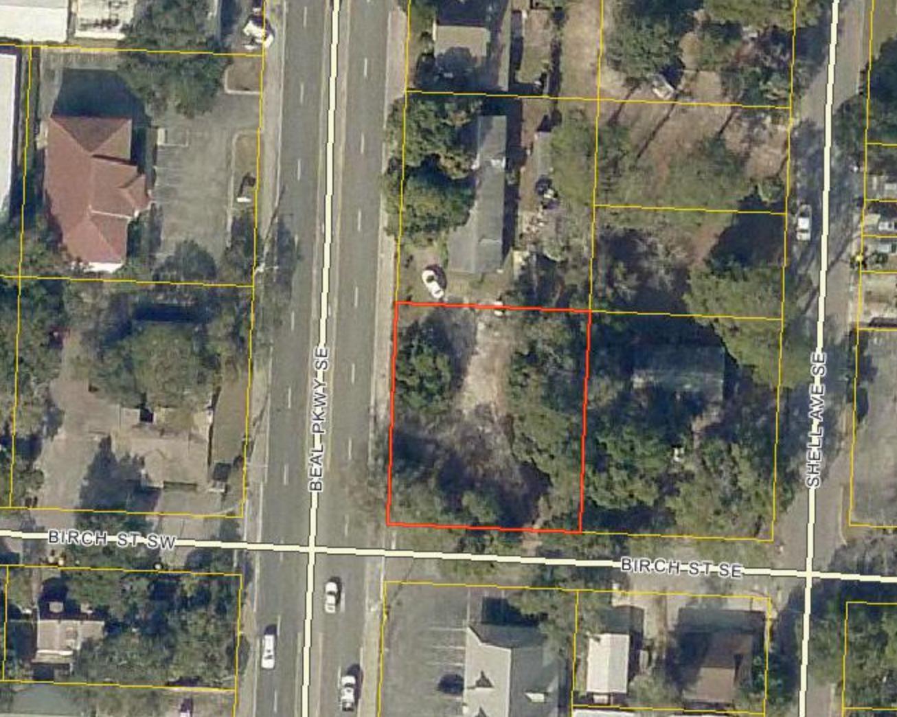 .26 vacant corner commercial lot located near Hwy 98 and Beal Pkwy intersection, great location for a commercial development