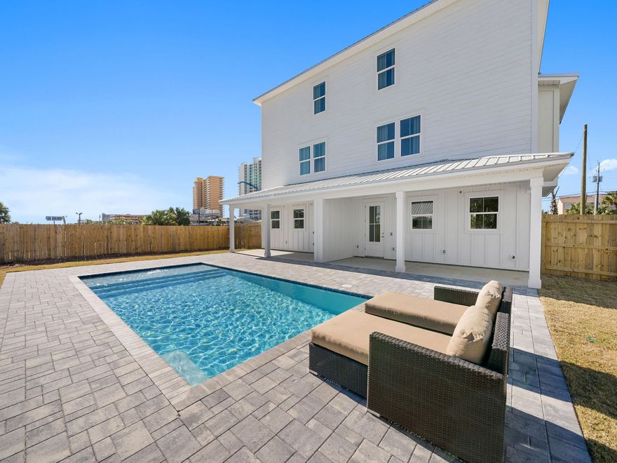 Embark on an investment journey with this eye-catching duplex, where the allure of Panama City Beach comes to life. This property offers breathtaking water vistas from its upper level and a spacious layout with five bedrooms on each side, plus additional bunk rooms, totaling 10 rooms alongside two bunk areas. Perfect for accommodating various group sizes, it ensures a comfortable and memorable stay for all guests. Step outside to enjoy the exclusive pool, a serene oasis just moments from your living space. With rental income projections ranging from $260,000 to $280,000, this duplex stands out as a premier investment opportunity in a coveted locale. Positioned merely a block from several beach accesses and two blocks from the famed Schooners seafood restaurant, the location is unbeatable.