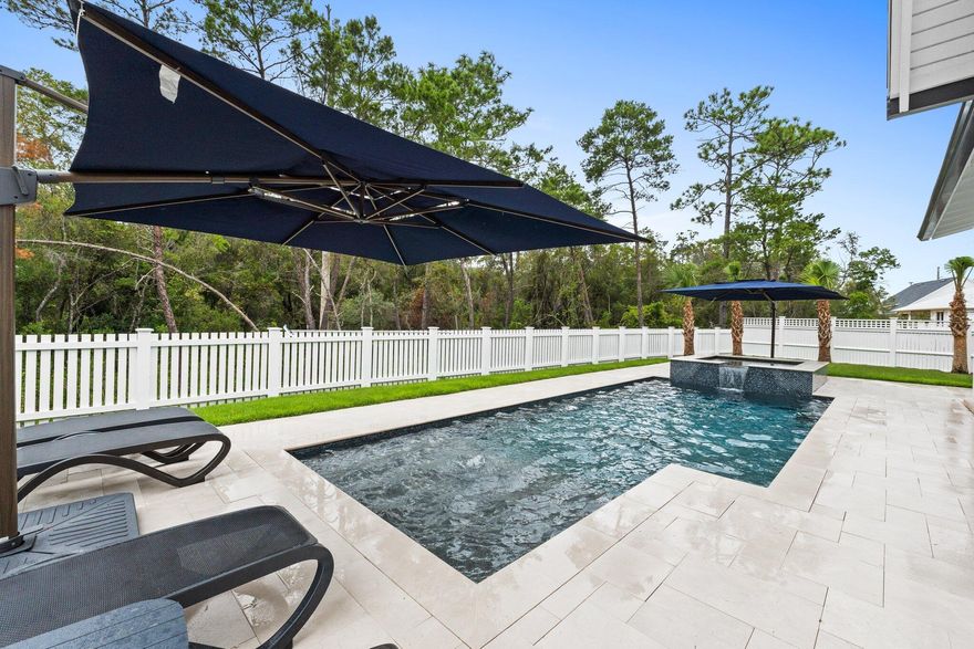 NEW CONSTRUCTION HAWTHORNE PLAN, is backed up to a lush nature preserve and fully fenced in, allowing you to enjoy your beautiful saltwater pool & hot tub with privacy! Offering 5 Bedrooms, 4.5 Baths, an extended driveway and lush landscaping this exceptional property is priced to sell! Don't miss out on this beautifully built Huff home with the perfect location in the highly sought-after, Lake Powell West in Watersound Origins.Watersound Origins is a master planned community offering an amenities center, resort-style pool, fitness center, tennis, pickleball, volleyball, basketball, playground & UNLIMITED GOLF on an award-winning course! The new TownCenter is just a walk or bike ride away &  offers a Publix, restaurants, shopping and medical facilities! All while a stones throw  from 30A!