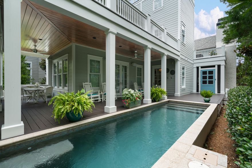 Spectacular home located in the main section of beautiful Watersound Beach! This 4 bedroom, 5 bath home boasts amazing privacy, backing up to Puttering Park, and is perfect for entertaining with multiple covered and open porches as well as a private pool! Features include hardwood flooring, quartz countertops, tiled baths with frameless glass doors, a Thermadore 6 burner range, vent hood, professional grade refrigerator, beverage cooler, ice maker, beamed and cathedral ceilings, multiple en suite baths and a 2 car garage with a carriage apartment complete with a full kitchen and separate bedroom! The 3rd floor tower makes for a perfect office space and has beautiful views of Watersound Beach and the Gulf of Mexico! This home is absolutely immaculate, turn key & a must see for 30a buyers.