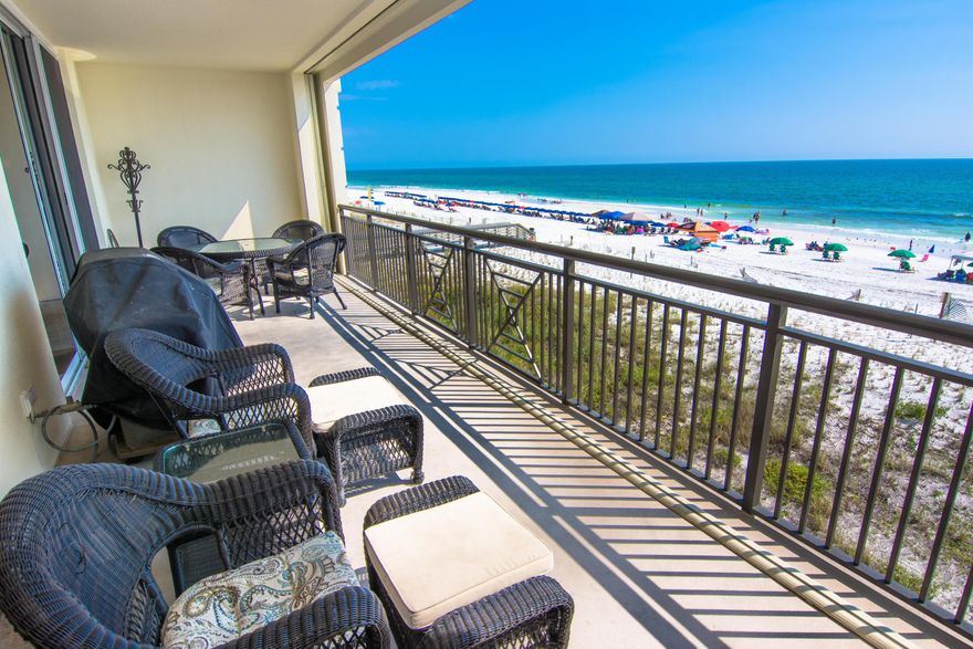 Luxe beach living in this impressive condominium at Bella Riva. This 4 bedroom, 3 bath condo is incomparably luxurious and timeless in its elegance. Enjoy one deeded covered parking space, a private balcony, a Gulf view/front master suite, and a beautiful gourmet kitchen featuring granite counters and Viking stainless steel appliances. This condo is being offered fully furnished with some recent additions and includes freshly polished travertine floors throughout the main living areas. Currently a vacation rental with excellent rental history! Partake in all the amenities Bella Riva has to offer you and your guests, including private beachfront entrance, gated entry to condominium, exercise room, beach side pool and spa, and lush landscaping.