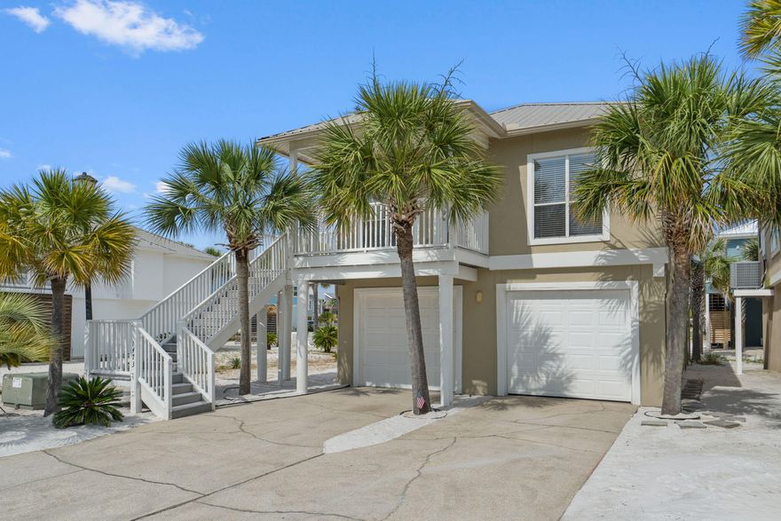 Hurry...this remodeled beach retreat is calling your name!  Nestled in the private, waterfront community of Homeport is this gem featuring 500 ft. of private beach front, a pier with boat and jet ski lifts and a pool with restrooms and new deck furniture.  With 3 bedrooms, 2 full baths, a walk-in closet in the primary, and beautiful quartz countertops in the kitchen, all you have to do is bring your family and your flip flops!  Take Advantage of Special Pricing:  $750,000 OR $760,000 +$10,000 to buyer at closing with accepted Offer and Closing in September 2025.  Contact us today for more details...