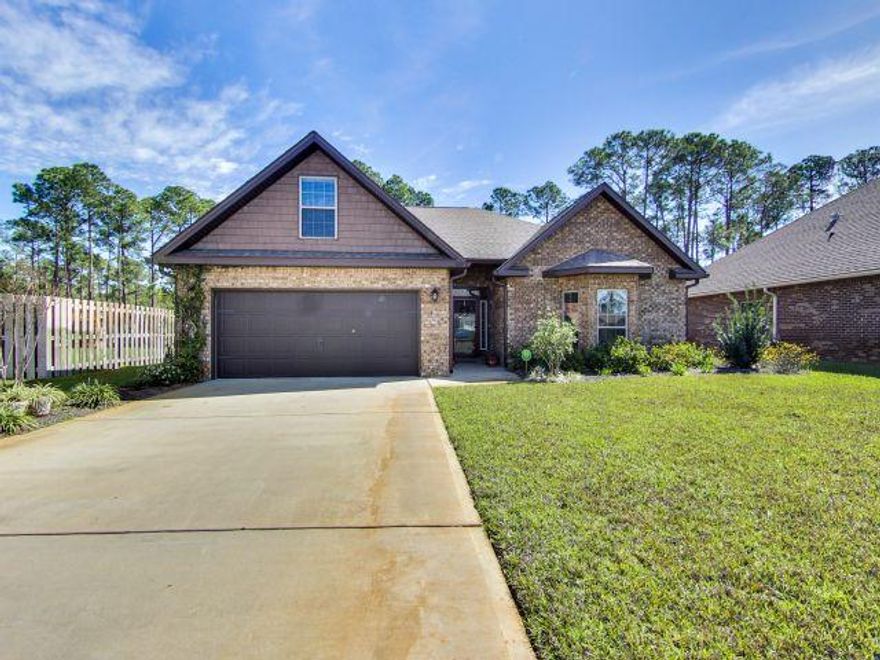Beautiful brick home located in the wonderful community of Driftwood Estates, adjacent to Sandestin on Mack Bayou. This home has great curb appeal with an expansive front yard and oversized driveway. Upon entry is a stunning foyer with open archway into the living area, dark hardwood floors, modern fixtures and crown molding. The floor plan is perfect for entertaining as the living area is open to the kitchen, dining area and sunroom. The kitchen features stainless steel appliances, granite countertops & breakfast bar. The dining area has great natural light and a separate entry to the sunroom. The sunroom features beautiful French doors that open to the living area but allow for privacy if needed. Just off the sunroom is the incredible screened-in patio overlooking the quiet preserve This outdoor space is the perfect spot to enjoy the gorgeous Florida weather. With the split floor plan, the master bedroom is located in the back of the home featuring tray ceilings, crown molding and hardwood floors. The master en-suite bath includes double vanities, granite countertops, large soak tub and separate glass shower. Both guest bedrooms are located at the front of the house and separated by a full guest bath. One of the best features of this home is the bonus room located upstairs for privacy. It can be utilized as an additional bedroom, office or playroom and includes access to a closet for additional storage. This beautiful home includes access to nice amenities including a community pool. The community is conveniently located close to Sacred Heart Hospital, Baytowne Wharf in Sandestin Resort and Grand Boulevard Towne Center with dining, entertainment, & shopping options as well as Publix and a movie theatre. You are also just a quick drive to either the Bay or the beautiful beaches of South Walton. This is an affordable opportunity that will not last long!