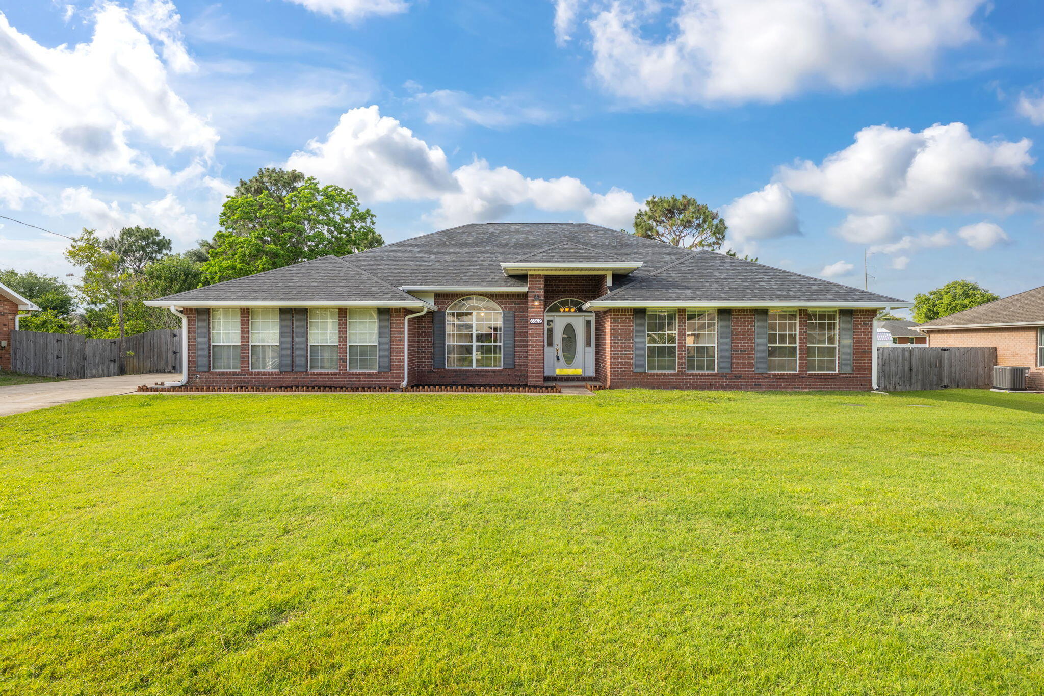 This ALL BRICK home has almost 3000 SQUARE FEET! Featuring a SIDE ENTRY GARAGE, PRIVACY FENCED BACKYARD, and INGROUND POOL W/HOT TUB! The interior features SPLIT BEDROOM Floor Plan, OPEN CONCEPT GREAT ROOM W/FIREPLACE, FORMAL DINING ROOM with FRENCH DOORS and BUILT INS, SPACIOUS KITCHEN with TILE FLOORS, GRANITE TOPS with BULLNOSE EDGING, STAINLESS APPLIANCES, BREAKFAST BAR, ISLAND and BREAKFAST NOOK. The Master Bedroom has TREY CEILINGS with the Master Bath featuring TILED FLOORS, JETTED WHIRLPOOL TUB, SEPARATE SHOWER, DOUBLE VANITY with GRANITE TOPS and HIS & HER CLOSETS. NEW ROOF & GUTTERS TOO! This home has tons of potential and with a little landscaping it could be your private tropical oasis! Schedule a showing today!