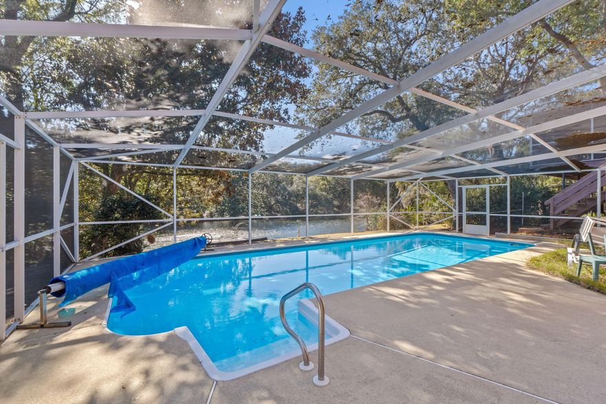 OPEN HOUSE FRIDAY 02/13  3PM-5PM Lakefront living at its best in Kenwood Estates! Star/t your mornings on the screened-in porch, taking in serene views of Bass Lake and the surrounding natural beauty. According to the County Appraiser, the home features 3 bedrooms and 3 full bathrooms, complemented by versatile flex rooms downstairs and a spacious family room that opens seamlessly to the pool--ideal for entertaining or relaxing with family and friends.Step outside to enjoy the in-ground pool with screen enclosure and the large backyard. The basement includes a dedicated workroom, offering excellent space for hobbies, projects, and storage. Additional highlights include a Generac whole-home generator and an EV/RV outlet in the garage, providing both peace of mind and convenience. Ideally located in Fort Walton Beach, just minutes from schools, shopping, dining, Eglin AFB, the airport, and the area's beautiful beaches, this lakefront retreat offers exceptional space, flexibility, and comfort. Don't miss this opportunityschedule your showing today.

