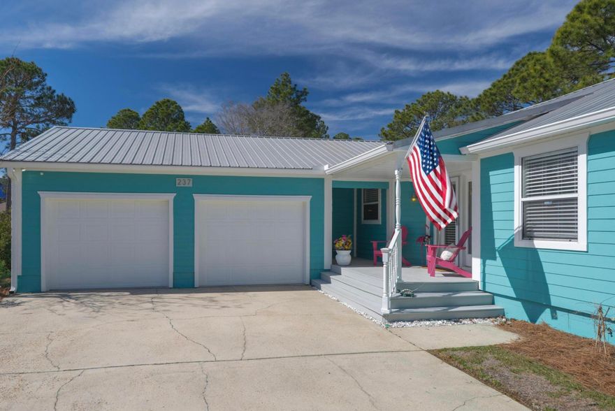 LOCATION IS SUPERB with NO HOA!  Beautiful 3 bed, 2 bath cottage located in the heart of Santa Rosa Beach! Backing up to state forest, minutes from Sandestin Resort, Baytowne Wharf, Grand Blvd, 30A area, Topsail State Park and the beach. Fantastic home with a great open living area and kitchen.  Granite counters and SS appliances.  Beautiful tile throughout - no carpet.  OVERSIZED two-car garage plus storage room and built ins, giving plenty of room for all your beach toys.  Split floor plan with master suite on one side and two bedrooms and a full bath on the other. Spend your peace filled mornings and evenings in the spacious screen room or back patio. Metal roof and newly painted fiber-cement siding makes this home low maintenance. Transferable home warranty until Jul 2028.