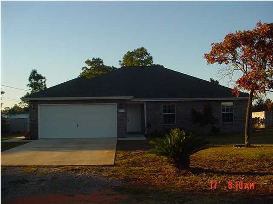 Nice 4 bedroom home in Navarre. In good shape! Chain link fenced back yard. Home is equipped with a security system that is not active. Living room wired for surround sound. Lawn pump and sprinkler system. Hurricane panels for windows. All electric home. This is a short sale.