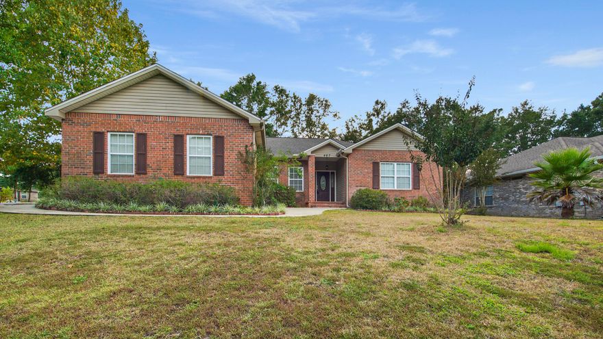 Impressive Price Improvement! Charming brick 4 bed/2 bath home is conveniently located in popular Magnolia Lake Estates, inside the city limits of DeFuniak Springs and convenient to schools, shopping, parks and a quick 35 minutes to the beaches. Situated on a corner lot with a cozy, shady back yard and side entry garage. Neat as a pin and lovingly cared for with a split floor plan and vaulted ceilings, making it feel open and even larger than it is. Hardwood floors in the living areas with carpet in the bedrooms. Lovely, large master suite with double vanity, new cultured marble shower and jetted tub. Home is beautiful and well maintained. Magnolia Lake is a small quaint neighborhood with one entrance plus a gazebo/picnic area with access to the lake for all homeowners.