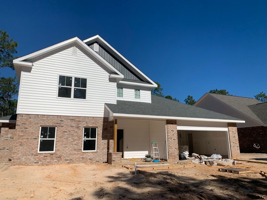 *New Community in East Navarre with Recreation & Dog Park Area  *Anticipated Completion May 2023 * This Plan Features: *4 Bedrooms  *2 Full Baths  *1/2 bath *2 Car Garage* Covered Entry * *Downstairs Owners Suite Features: Builder's Signature Zero Entry All Tile Walk in Shower, Double Vanities & Large Walk-in Closet  *Tile bathroom floor *First Floor Formal areas all have LVP flooring *Kitchen Features:  *Granite Countertops,  Large Island, Shaker Style White Cabinets, Stainless Steel Appliances & Walk in Pantry * Breakfast Cafe  *Separate Utility Room conveniently located off of Kitchen *Oversized bedrooms and Loft area Upstairs *Covered Rear Lanai * 2x6 Exterior Construction * Builder & Structural ''Maverick'' Home Warranty Included* BUILDER PAYS CLOSING COSTS WITH PREFERRED LENDER *