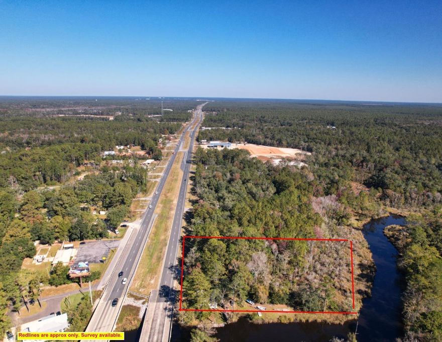Catch spectacular sunrises and sunsets from this unique 1.012 acres Commercial property offering 262' of frontage on the Lagrange Bayou which leads to Choctawhatchee Bay and  98' of Paved Road frontage US Hwy 331 S. 

This beautiful property offers many options for Commercial use property as well as gorgeous setting for a restaurant, doctor's office/law office or a lovely new residential home. (The general commercial use allows for (1) residential home to be built.)  

Property is being sold ''As Is''.  Not eligible for a home loan due to the condition of the home.  The existing old cabin on the property has not been given any value.  It needs extensive repairs and may not meet currently zoning requirements.  It is the buyer's responsibility to verify building codes & zoning regulations.  Zoned General Commercial. However, property is partially located in within the Freeport city limits & partially within the county.