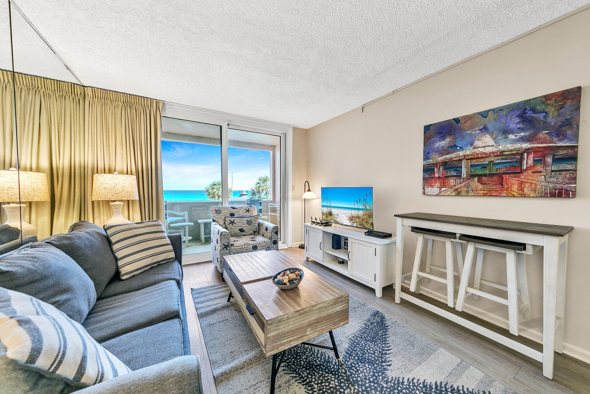 Discover serene Gulf views from this beachfront condo at Jetty East, ideally situated on Holiday Isle off Gulf Shore Drive in Destin. This 1-bedroom gem offers direct access to the sandy shores, making it a prime choice for those seeking an affordable yet lucrative vacation rental opportunity. Enjoy robust rental income with the added benefit of resort-style amenities, including a private beach, pool, expansive grilling pavilion, and courts for tennis and pickleball--all without the hustle and bustle of a busy highway nearby. Revel in the convenience of being just moments from the action, with the luxury of retreating to peace and quiet. Recently updated, featuring a modern kitchen and new furniture as of November 2021. This property is not just a purchase; it's a lifestyle investment.