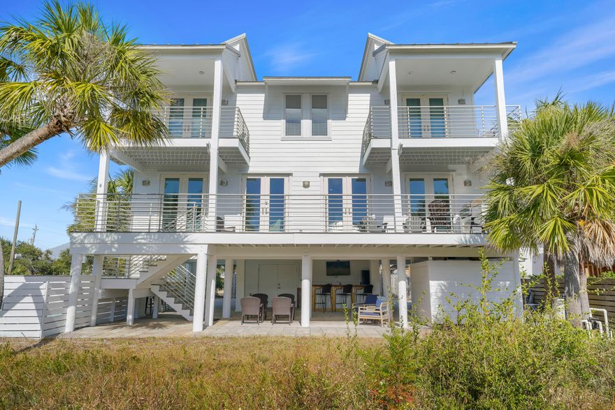 Located in a gated community in a quiet area of Miramar Beach, this coastal-style estate is just a short 2 minute walk to your deeded beach access.  An abundance of balcony space along with its open living and dining area make this home a great place for gathering and taking in the gorgeous Gulf views - which can be seen from all 4 bedrooms as well as the living and dining areas!  Outside, you'll be greeted with a private pool with a relaxing waterfall, and ample lounging.