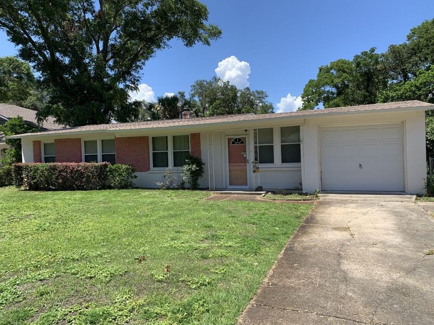 Own your own piece of paradise. Situated on a palm tree lined street just a couple blocks away from the bay, this well loved family home is waiting for you.  With 2 bedrooms (the master has it's own sitting room) and 1 bath, large living room, eat in kitchen, formal dining room, and massive back yard large enough for a pool, this would be the perfect starter home, vacation getaway, or home for the anyone ready to downsize. Recent upgrades include: lawn pump, roof in 2017, wiring in 2012, heating in 2000, a/c in 2008, water heater in 2012, kitchen remodeled in 2011, plumbing in 2012, bathroom remodeled in 2011, hurricane windows in 2008, and the garage door in 2008. Close to shopping, restaurants, the beach, and minutes to both bases, this is the perfect location for everyone.  Let's make