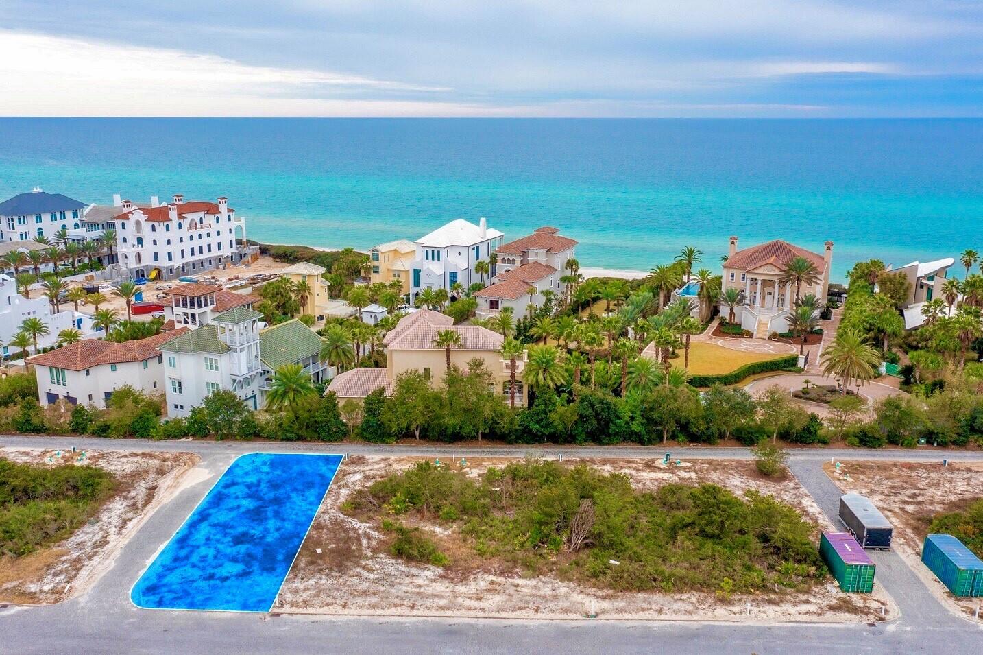 Newly released Custom Homesite UU5 brings to market a unique & welcomed variance to the Alys Beach Design Code. For the first time ever is an allowed 2 1/2 story home build with roof terraces showcasing the Alys Beach roof top architecture & view of the Gulf of Mexico.Homesite UU5 is situated on the corner of Elbow Beach Road and Salt Spray Alley fulfilled in a North to South manor capturing East to West sunlight. This iconic location will satisfy the most design savvy having this corner condition. Design opportunities are endless capturing this homesite's scaling to create beautiful indoor & outdoor elements. Courtyard pool, roof top terrace with summer kitchen for entertaining are only the beginning. This prestigious homesite is within close proximity of the private owners Beach Club and all amenities including Town Center.