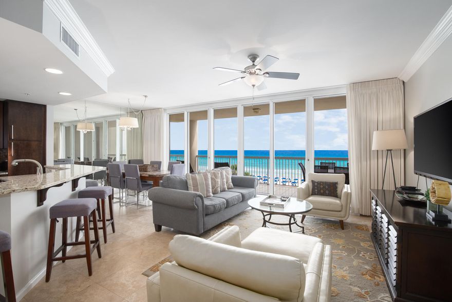 A perfectly positioned 4th Floor Luxury Beach Front Condo! Upon entering, you will be amazed at the Floor to Ceiling windows and unobstructed views of the Emerald Coast. The Balcony is spacious enough to accommodate both lounging and an outdoor dining area. This is 3-bedroom, 3-bathroom unit which also comes with a covered assigned parking space. The open floor plan allows for views from the kitchen, living and dining areas. Featuring a Beach Front Main Suite with direct access to the balcony and large windows which offer stunning views from the bed and bathroom areas. It also offers a seating area, walk in closet and an en-suite bathroom with shower, separate tub & double vanity. Two more bedrooms and bathrooms plus a full-size laundry area complete this floor plan. Sold fully furnished