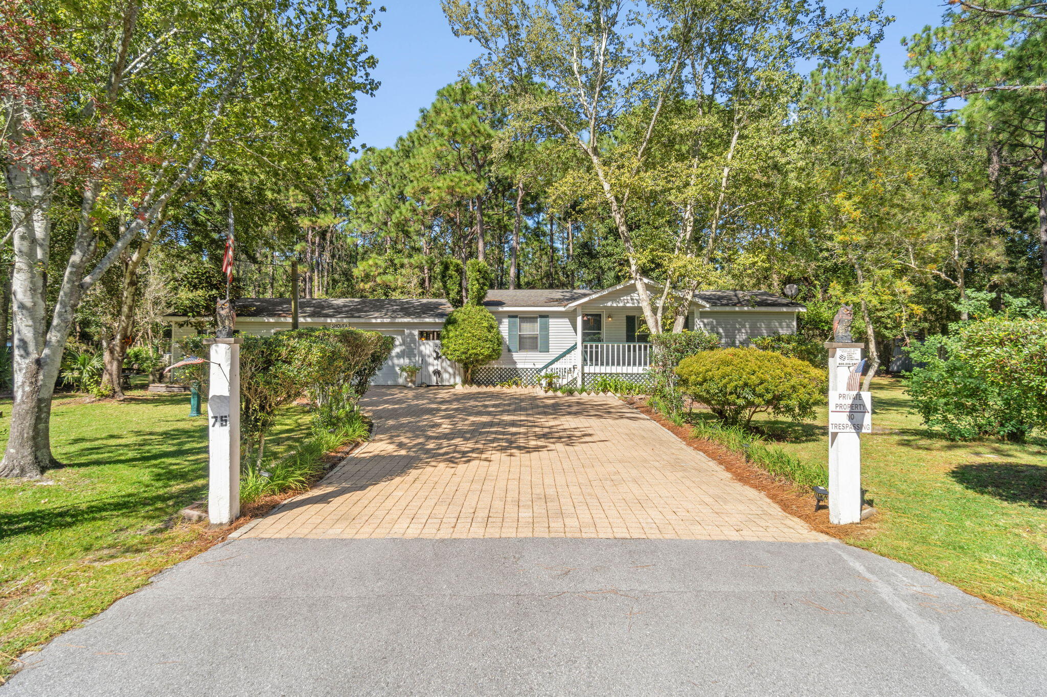 Discover your gardener's paradise on this enchanting half-acre property nestled in the heart of Santa Rosa Beach. As you approach, you'll be welcomed by a spacious paved driveway that accommodates multiple vehicles, leading to a custom-built, oversized two-car garage. This impressive garage offers ample space for your vehicles, tools, and more, plus a versatile bonus room that can serve as an office, workout space, or additional storage. Step inside to find an inviting open floor plan that seamlessly connects a generous living area, dining space, and a beautifully tiled kitchen. The primary bedroom, located to the right, features an en suite bathroom for added privacy, while the second bedroom on the left boasts a full bathroom with convenient Jack and Jill doors. The real highlight of 
The real highlight of this home is the expansive 400 sqft screened-in back patio, perfect for entertaining, complemented by a charming separate bar area. Enjoy serene views of the meticulously landscaped backyard, complete with a cozy fire pit and an additional storage shed. Conveniently located just a 6-minute drive from the stunning white sand beaches of 30-A and a quick 10-minute trip to the vibrant shopping scene at Grand Boulevard, this property offers the perfect blend of tranquility and accessibility. Don't miss outcontact your favorite realtor today to schedule a tour!