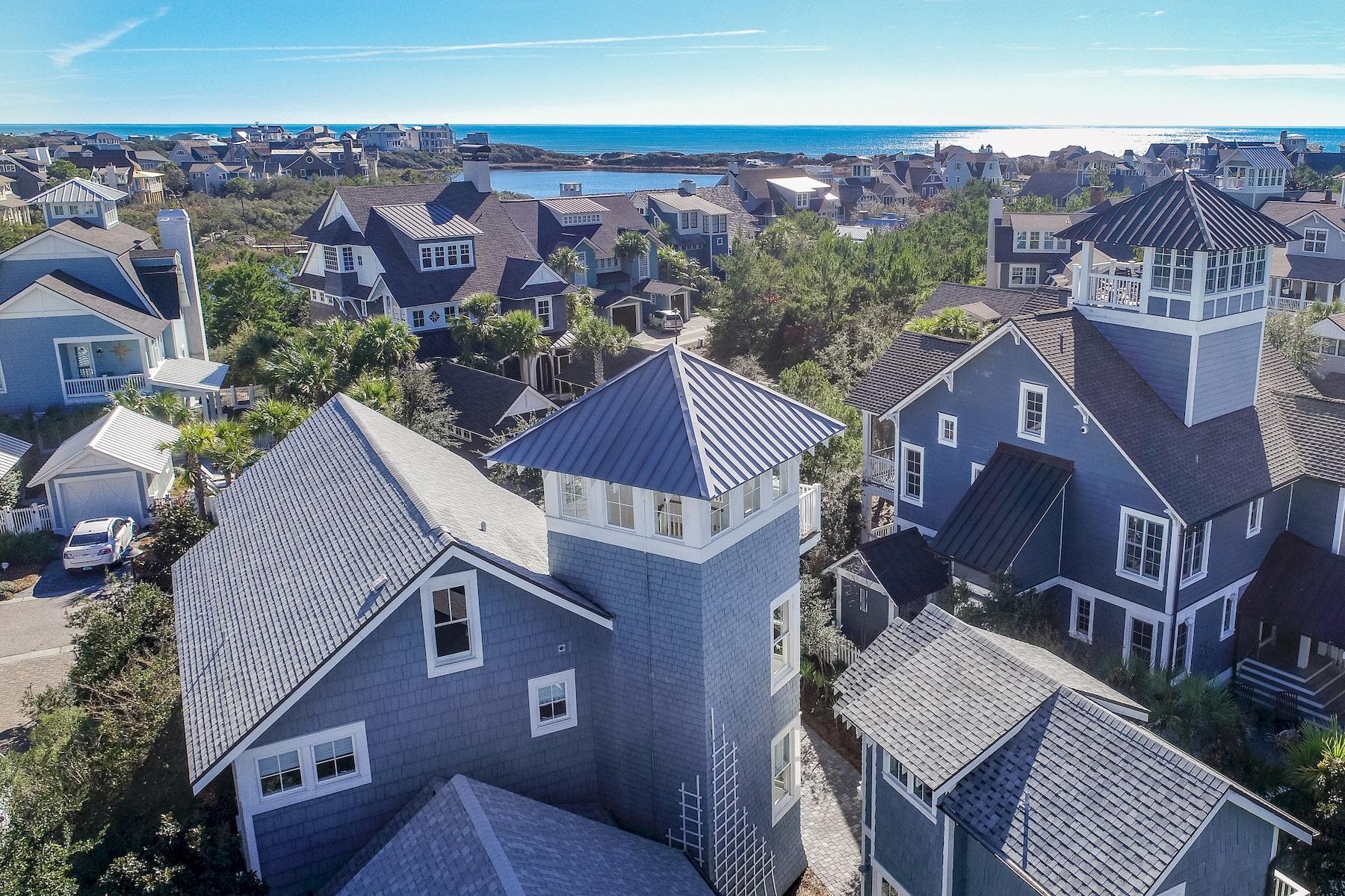 Gulf views rarely come in a better package than this WaterSound home. This characterful residence includes eye-catching architectural features, enviable outdoor living space and a carriage house with kitchenette for guests. This quintessential beach home is steps from the white sandy beach and warm gulf waters in a sought-after community bordering Camp Creek Lake. Melissa Skowlund of Summer House Lifestyle has put her inimitable stamp on the newly refreshed interior dcor. Gleaming hardwood floors, soaring ceilings and detailed craftsman trim provide those luxury touches that create a unique and comfortable home. You'll immediately appreciate the design and spaciousness. There's a 2nd living room on the first floor with custom-built storage ready for you to display your personal treasures