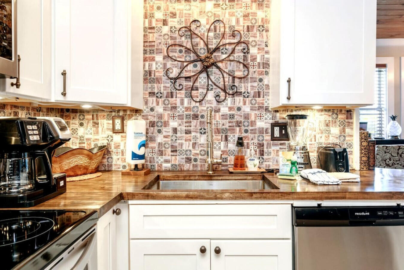 Rental machine! 2 bedroom with 2 FULL bath, within a gated community that has 3 swimming pools, tennis courts, and is a short drive to the beach! This condo is completely remodeled. Our rare layout of two bedrooms & two attached full bathrooms leaves plenty of room for your entire group to enjoy. We can accommodate up to 8 guests in our cozy setting. You'll be impressed with the level of detail that has gone into the decor here, with custom touches from floor to ceiling!