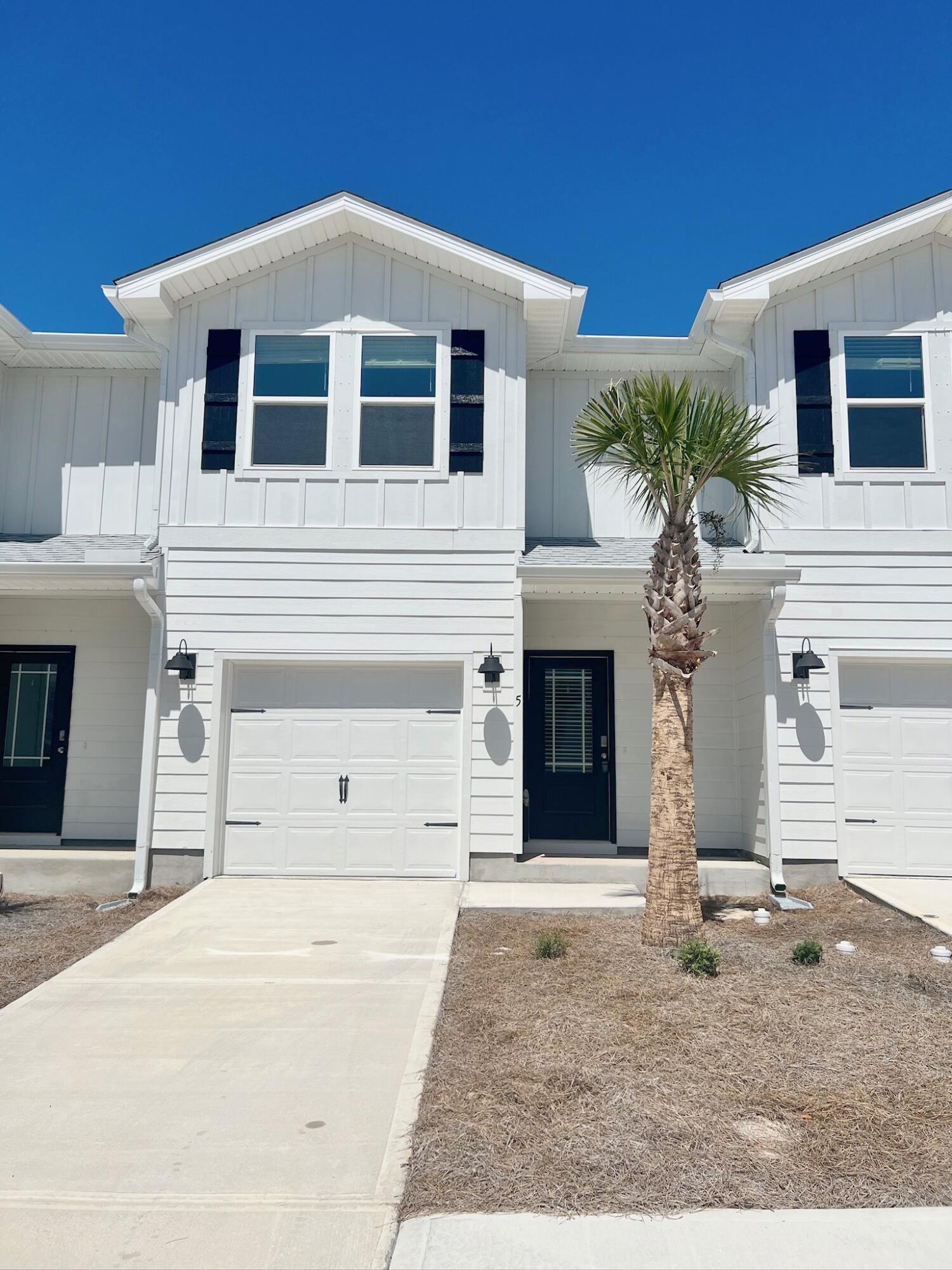 HOME WILL NOW BE VACANT 5/31/25.Discover the perfect fusion of elegance and convenience in this pristine townhome, nestled in the heart of Destin. Built in 2023, this beautifully designed 3 bed/2.5 bath home boasts 1,537 square feet of living space, making it an exceptional opportunity. Step inside and be greeted by an open-concept floor plan that floods the living and dining areas with natural light. The kitchen is a chef's dream, featuring white cabinetry, tile backsplash, quartz countertops, stainless steel appliances, a spacious breakfast bar, and a farm-style sink.Upstairs, all three bedrooms offer private retreats, with the primary suite providing the ultimate luxury. It boasts an ensuite bathroom complete with a double vanity and a walk-in tile sh Additional conveniences include an in-unit washer and dryer and an attached garage.

Step outside and relax on the private patio, the perfect spot to soak up the Florida sunshine. Beyond your doorstep, this home's prime location offers easy access to Destin's world-renowned white-sand beaches, shopping, dining, and popular attractions like Big Kahuna's Water and Adventure Park, the Destin Harbor Boardwalk, and Crab Island. Eglin Air Force Base and Hurlburt Field are conveniently located, approximately 14 miles away.