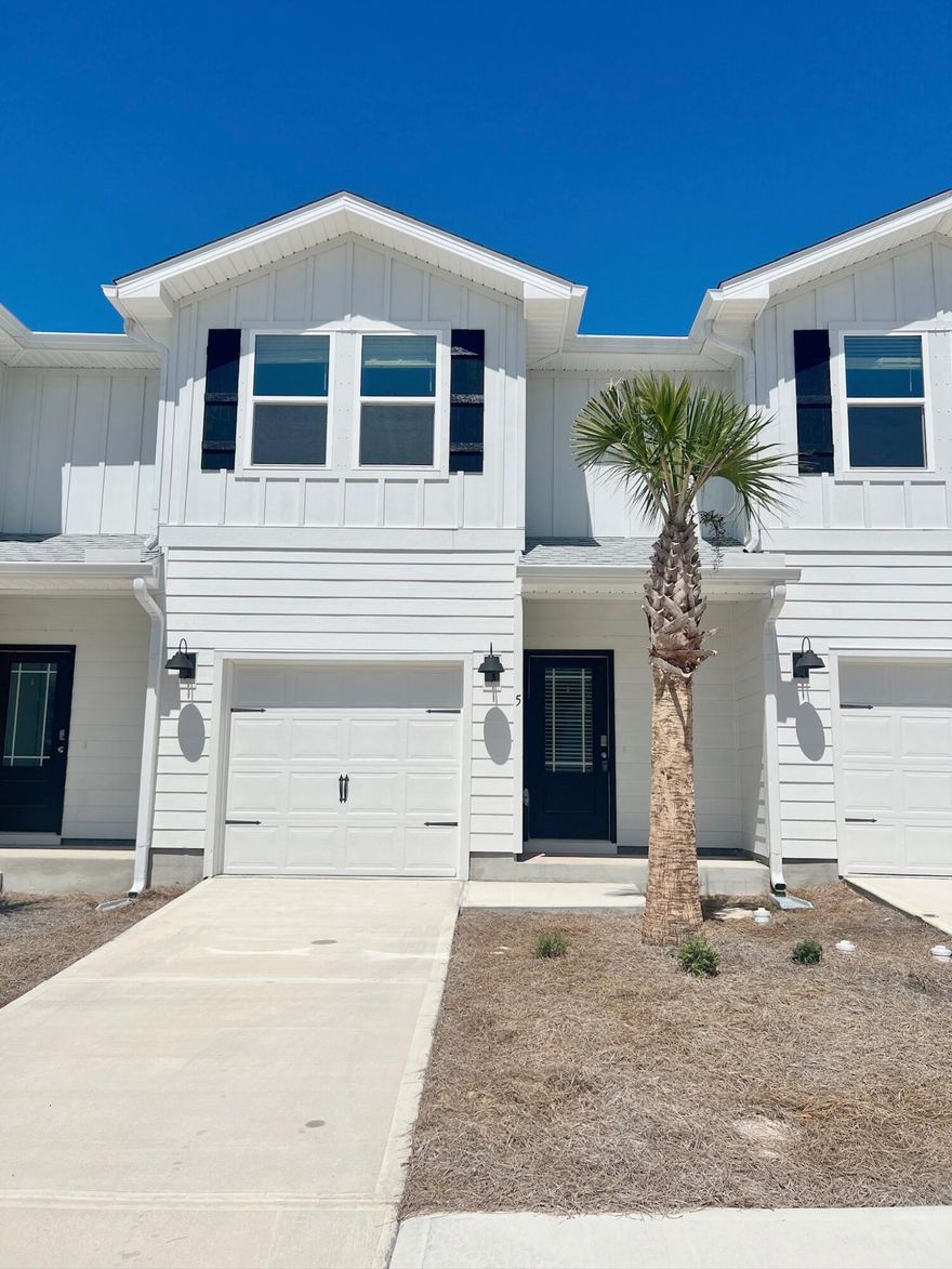 HOME IS NOW VACANT! Discover the perfect fusion of elegance and convenience in this pristine townhome, nestled in the heart of Destin. Built in 2023, this beautifully designed 3 bed/2.5 bath home boasts 1,537 square feet of living space, making it an exceptional opportunity. Step inside and be greeted by an open-concept floor plan that floods the living and dining areas with natural light. The kitchen is a chef's dream, featuring white cabinetry, tile backsplash, quartz countertops, stainless steel appliances, a spacious breakfast bar, and a farm-style sink.Upstairs, all three bedrooms offer private retreats, with the primary suite providing the ultimate luxury. It boasts an ensuite bathroom complete with a double vanity and a walk-in tile sh Additional conveniences include an in-unit washer and dryer and an attached garage.

Step outside and relax on the private patio, the perfect spot to soak up the Florida sunshine. Beyond your doorstep, this home's prime location offers easy access to Destin's world-renowned white-sand beaches, shopping, dining, and popular attractions like Big Kahuna's Water and Adventure Park, the Destin Harbor Boardwalk, and Crab Island. Eglin Air Force Base and Hurlburt Field are conveniently located, approximately 14 miles away.