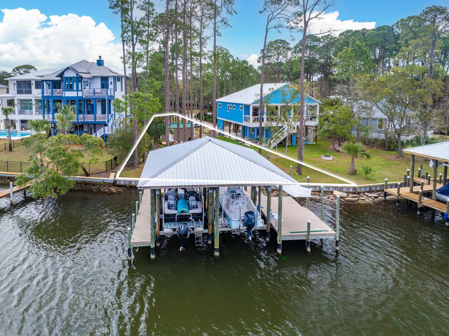 Rare waterfront lot offering 73 feet of direct frontage on Buck Bayou, with seamless access to Choctawhatchee Bay. Spanning .23 acres of prime coastal property, this exceptional homesite is ready for your custom build, complete with a new seawall and freshly laid grass.Enjoy a generous deep-water dock equipped with two boat lifts and a dedicated paddleboard launch -- perfect for boating enthusiasts and those who love life on the water. With no HOA and no required build timeline, you have the flexibility to create your ideal retreat at your own pace.Ideally located near Choctawhatchee Bay, the Intracoastal Waterway, and Crab Island, this property offers exceptional access to some of the area's most sought-after boating destinations.Bring your vision to life with an available footprint showcasing a thoughtfully designed 2,826-square-foot residence, complemented by a 1,395-square-foot carport and 720 square feet of porches -- all designed to maximize outdoor living and capture serene water views. 

Water tap and electric are already installed, sewer is available, and both the survey and wetlands report have been completed. The wetlands report confirms the entire parcel consists of uplands, providing added confidence as you plan your build.