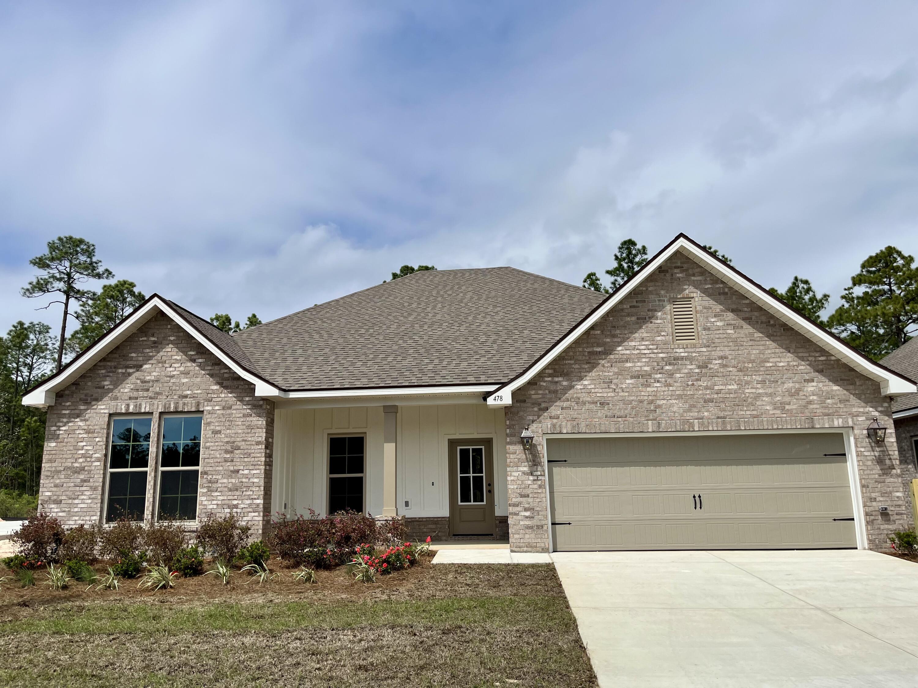 The COMSTOCK III G in Bird Song at Hammock Bay community offers a 4BR, 2BA, open design. Upgrades added (list attached). Features: double vanity, garden tub, separate custom tiled shower, and walk-in closet in master suite, kitchen island, walk-in pantry, boot bench in mudroom, covered front porch and rear patio, walk-in closets, crown molding, recessed lighting, framed mirrors, smart connect WIFI thermostat, smoke/carbon monoxide detectors, landscaping package, architectural 30-year shingles, flood lights, and more!Energy Efficient Features: water heater, kitchen appliance package, vinyl low E windows, and more! Energy Star Partner.