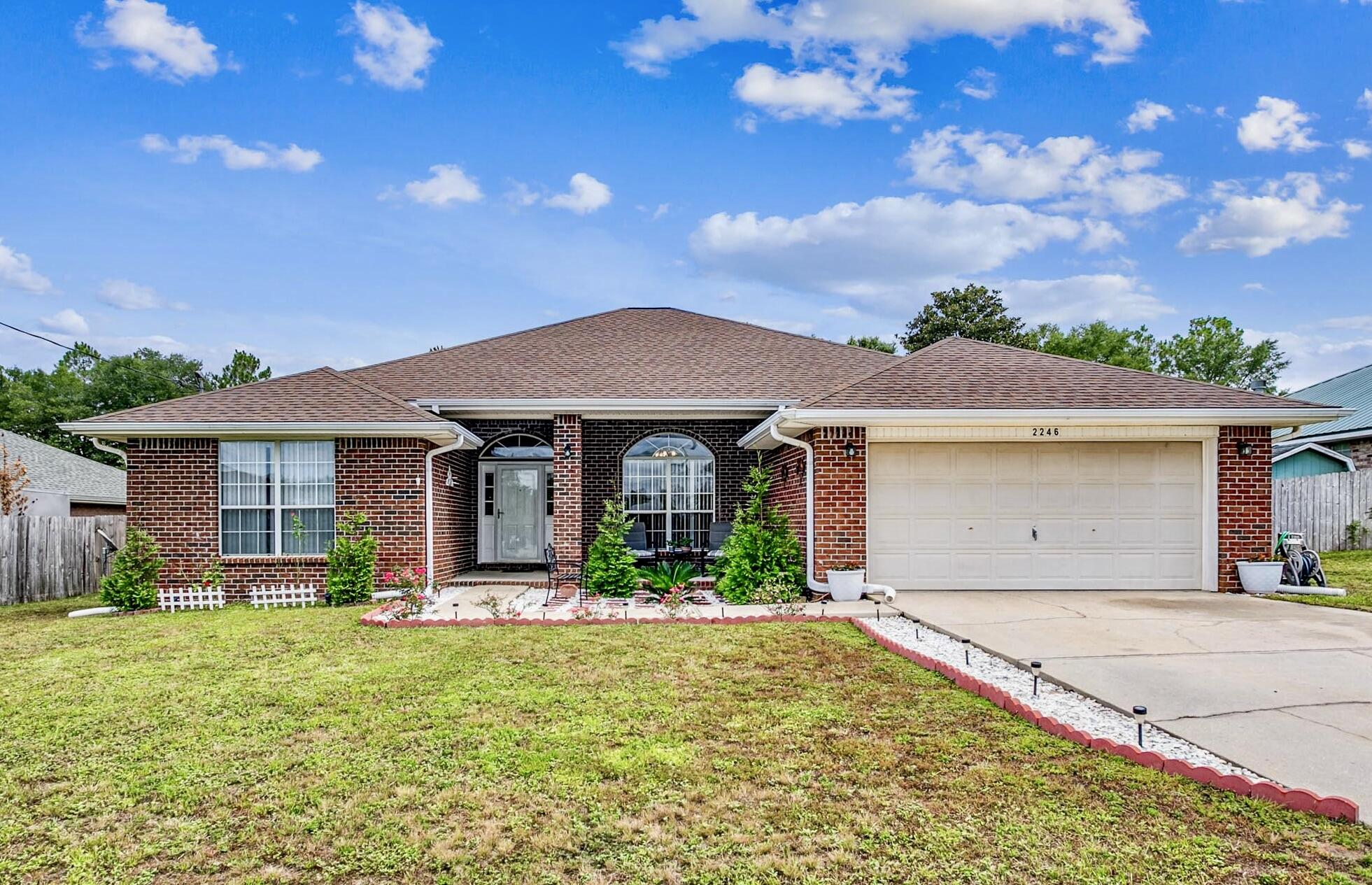 Wow! You've found your dream home! This spacious and stylish all-brick property boasts four bedrooms, two bathrooms, and an open floor plan with dramatic high vaulted ceilings. The kitchen is bright and well-appointed, with plenty of cupboard space. And the best part? It has a new roof and AC updates for affordable insurance! You can relax in the nicely planned entryway garden court, or enjoy the spacious .25-acre level fenced backyard for playing, BBQing, or hosting games. Plus, it's conveniently located near a 18-hole golf course, a high-tech driving range, pickle ball courts, and a delicious restaurant within walking distance. Don't miss out on this opportunity! Call today to schedule a tour and make this dream home yours!