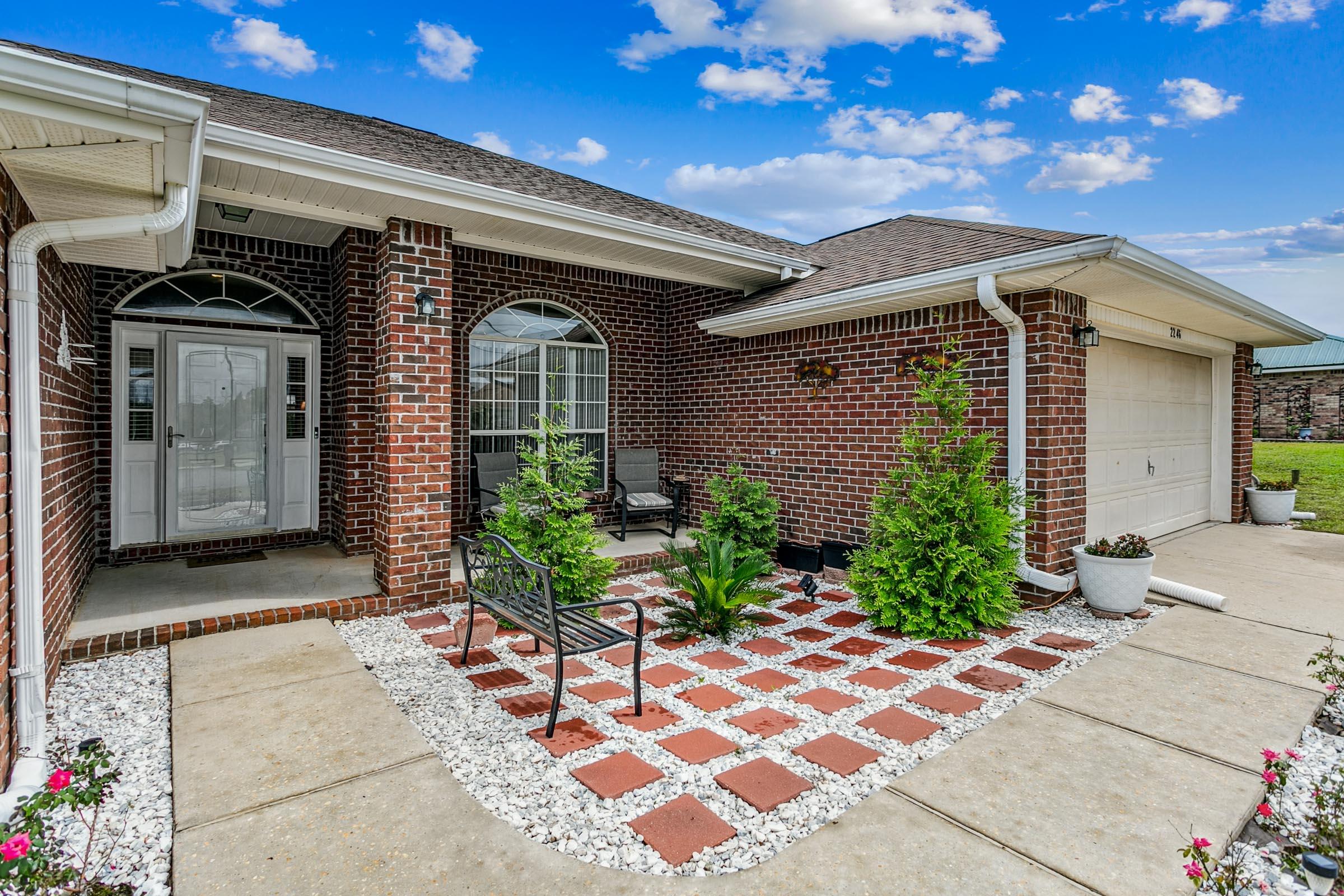 Wow! You've found your dream home! This spacious and stylish all-brick property boasts four bedrooms, two bathrooms, and an open floor plan with dramatic high vaulted ceilings. The kitchen is bright and well-appointed, with plenty of cupboard space. And the best part? It has a new roof and AC updates for affordable insurance! You can relax in the nicely planned entryway garden court, or enjoy the spacious .25-acre level fenced backyard for playing, BBQing, or hosting games. Plus, it's conveniently located near a 18-hole golf course, a high-tech driving range, pickle ball courts, and a delicious restaurant within walking distance. Don't miss out on this opportunity! Call today to schedule a tour and make this dream home yours!